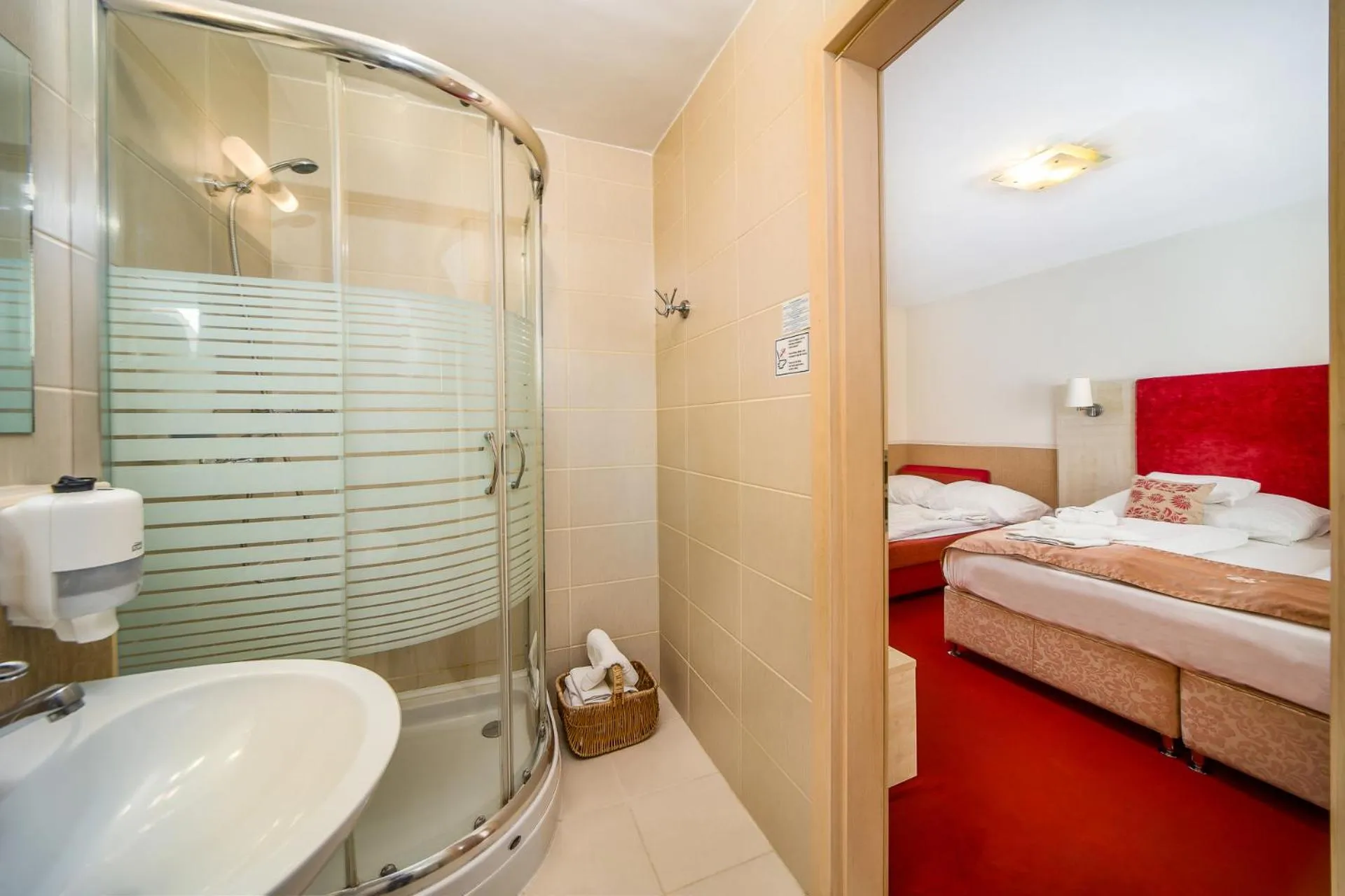 Bathroom, Bed in Hotel Piroska