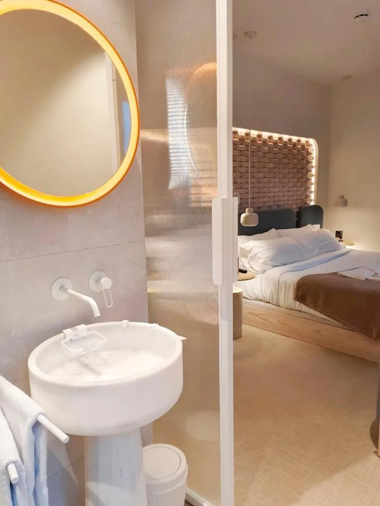 Bed in Hotel Faro Lariño