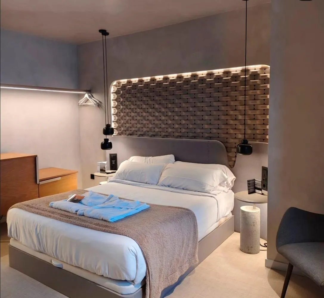 Bed in Hotel Faro Lariño