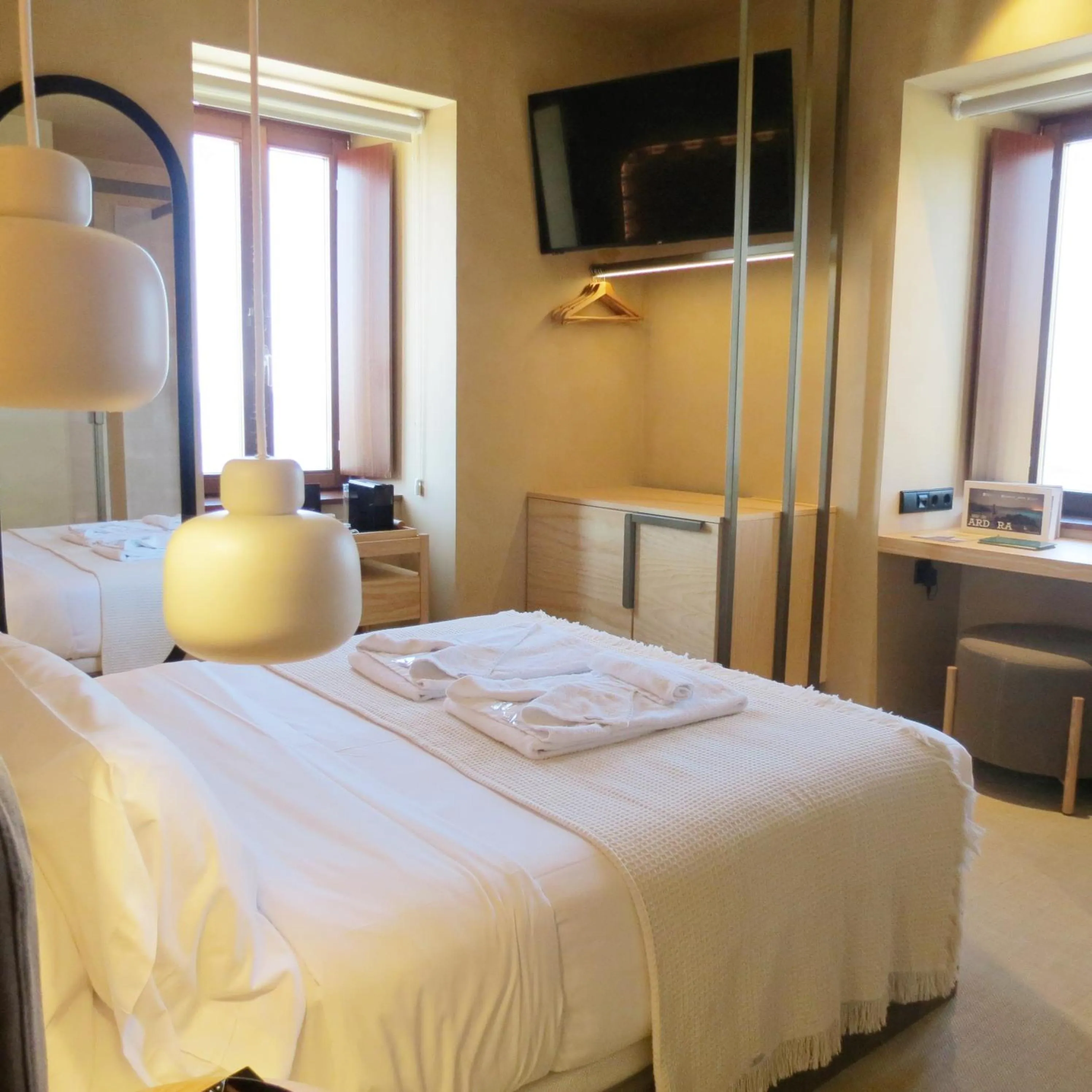 Photo of the whole room, Bed in Hotel Faro Lariño