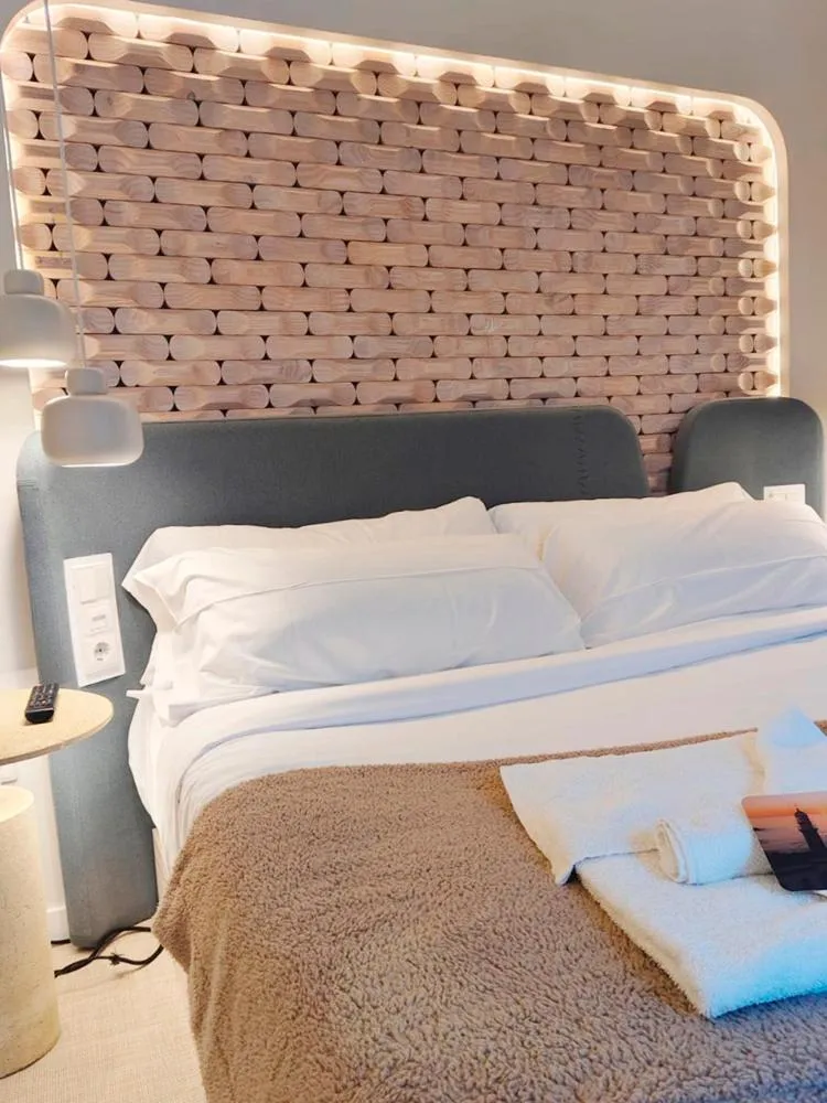 Bed in Hotel Faro Lariño