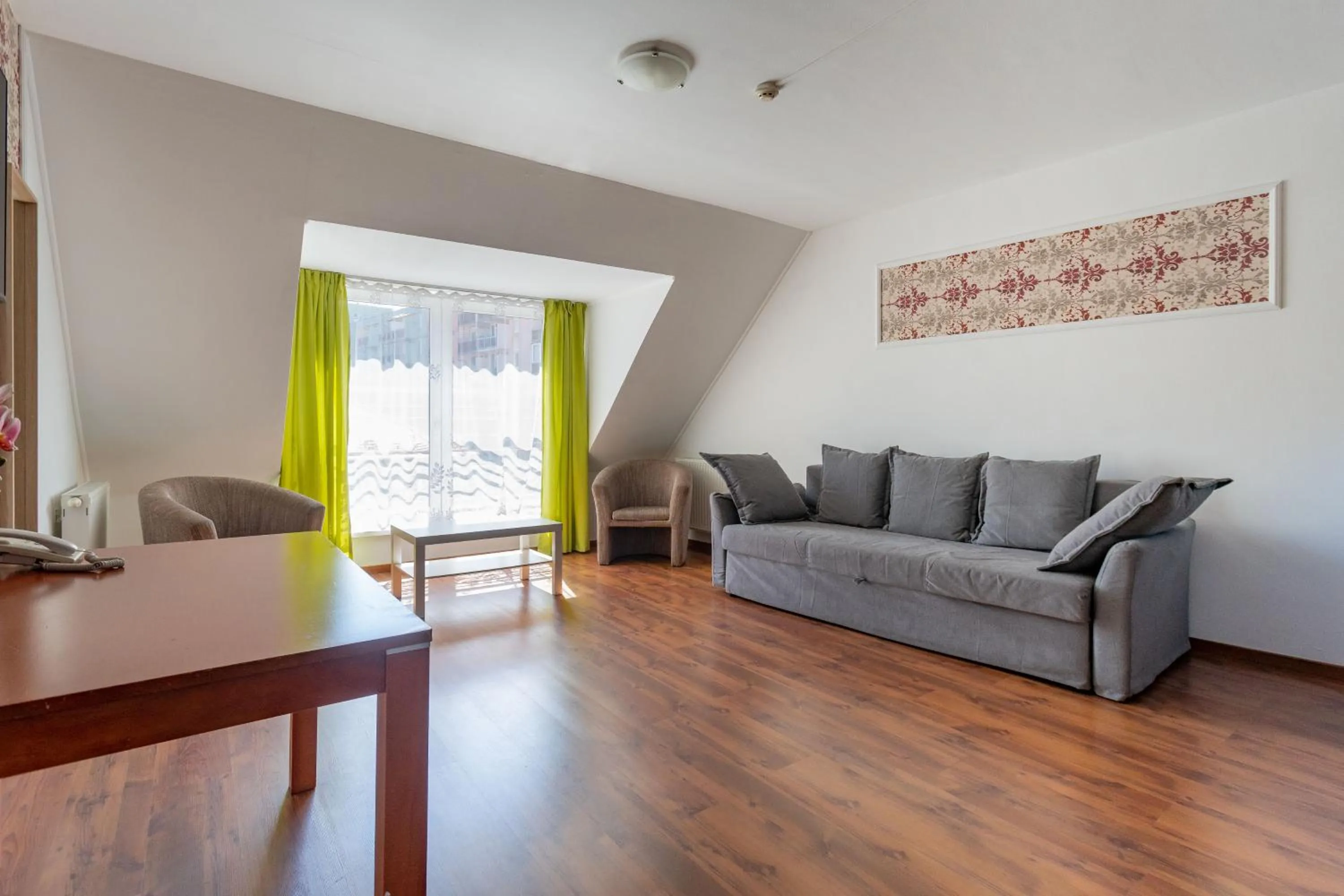 Living room in Triple M Hotel