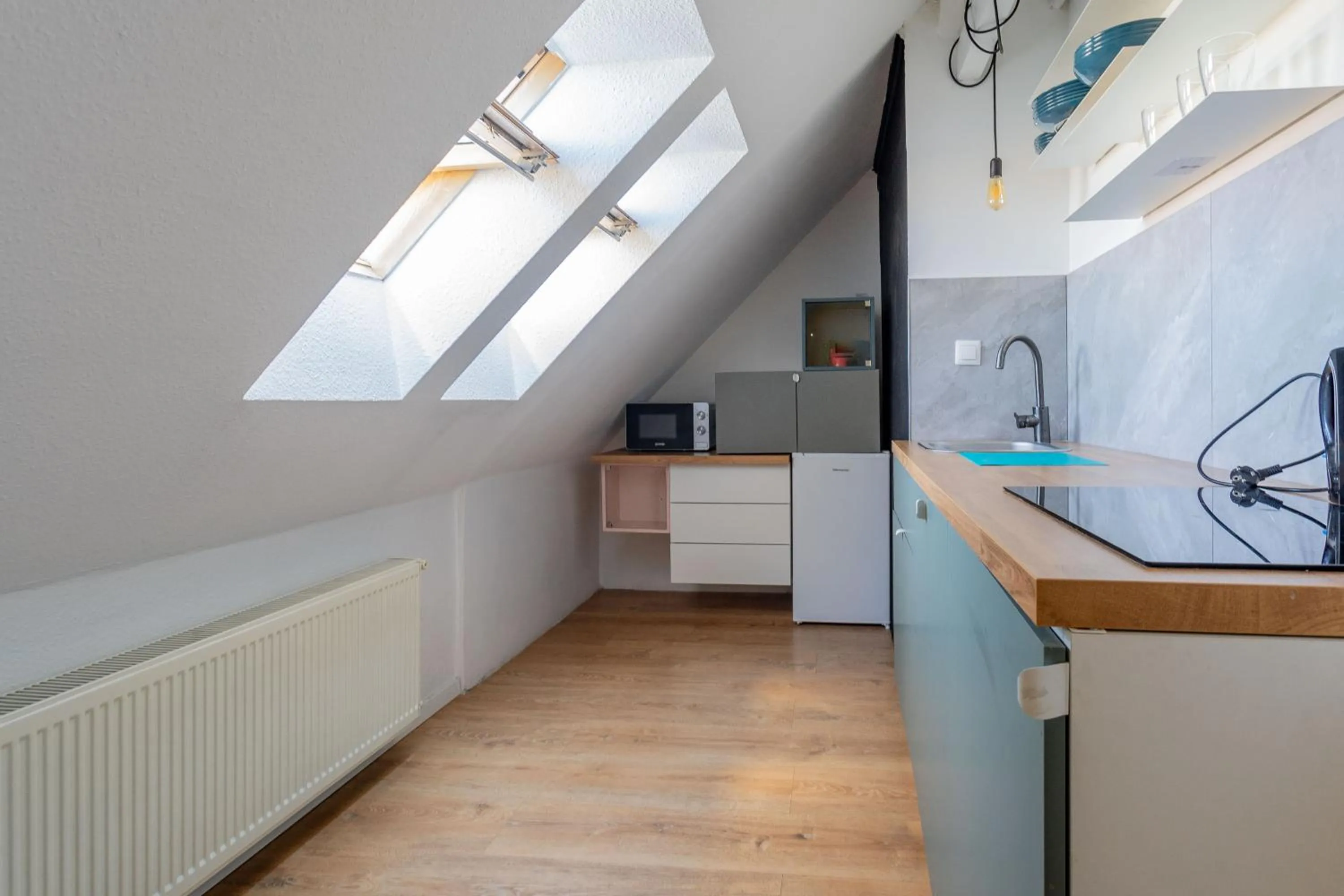 microwave in Triple M Hotel