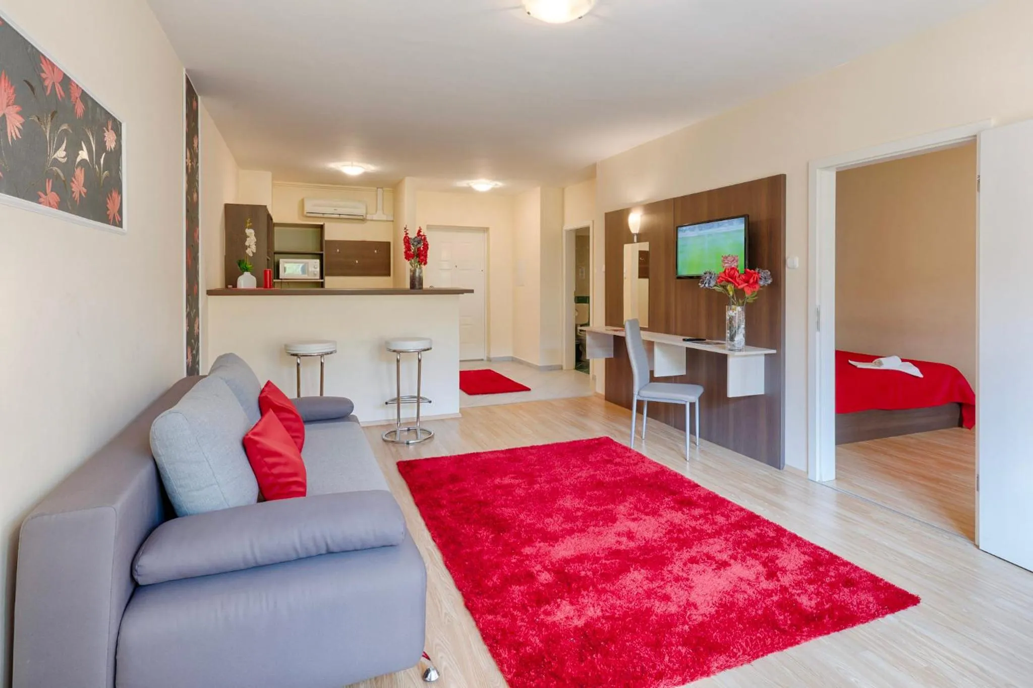 Living room, Bed in Triple M Hotel