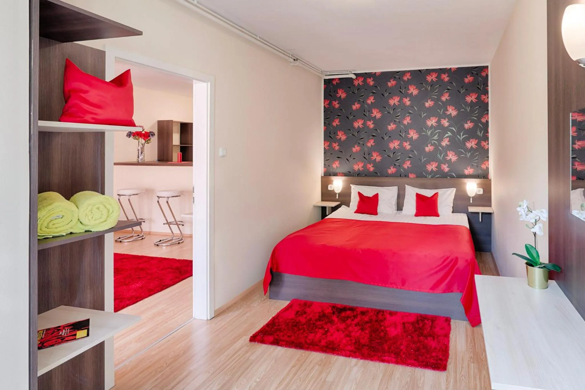 Bed in Triple M Hotel