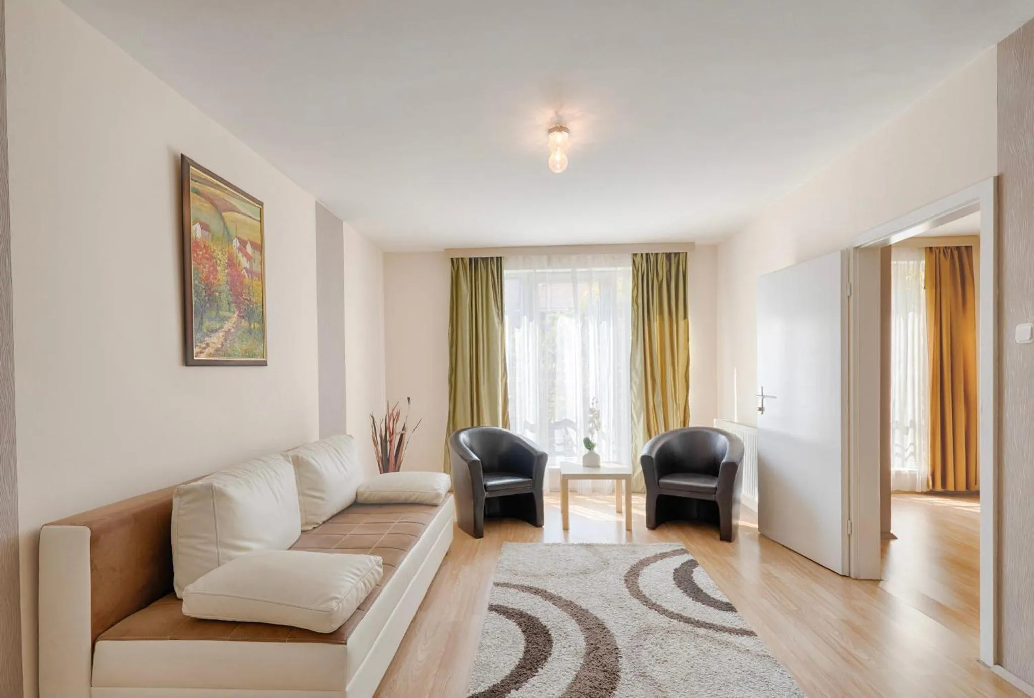 Living room in Triple M Hotel