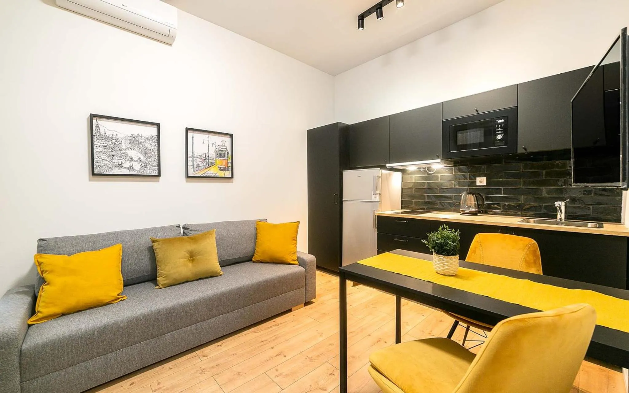 Communal lounge/ TV room in A13- Boutique Apartments, Best Location, by BQA