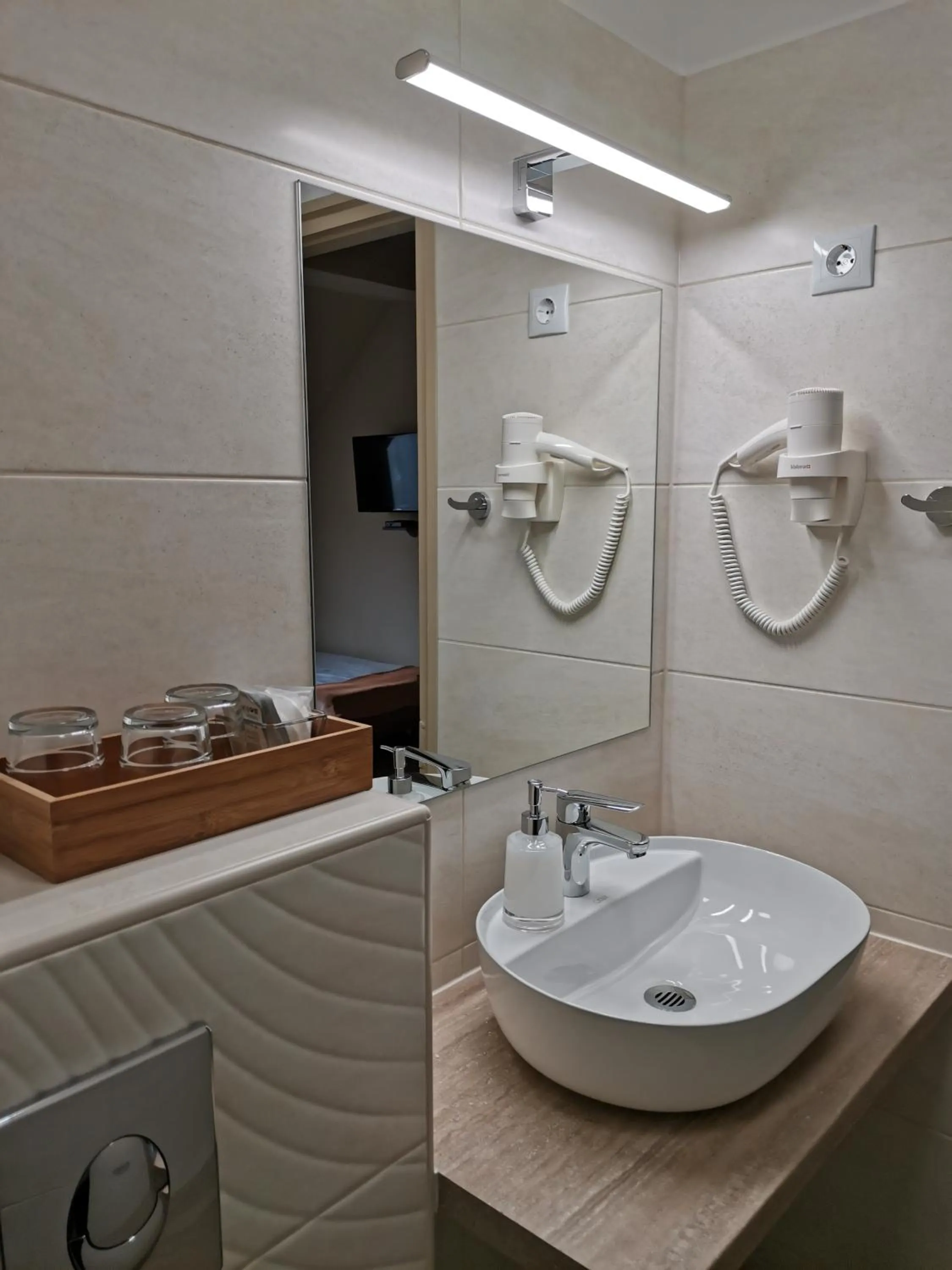 Bathroom in Alfa Hotel