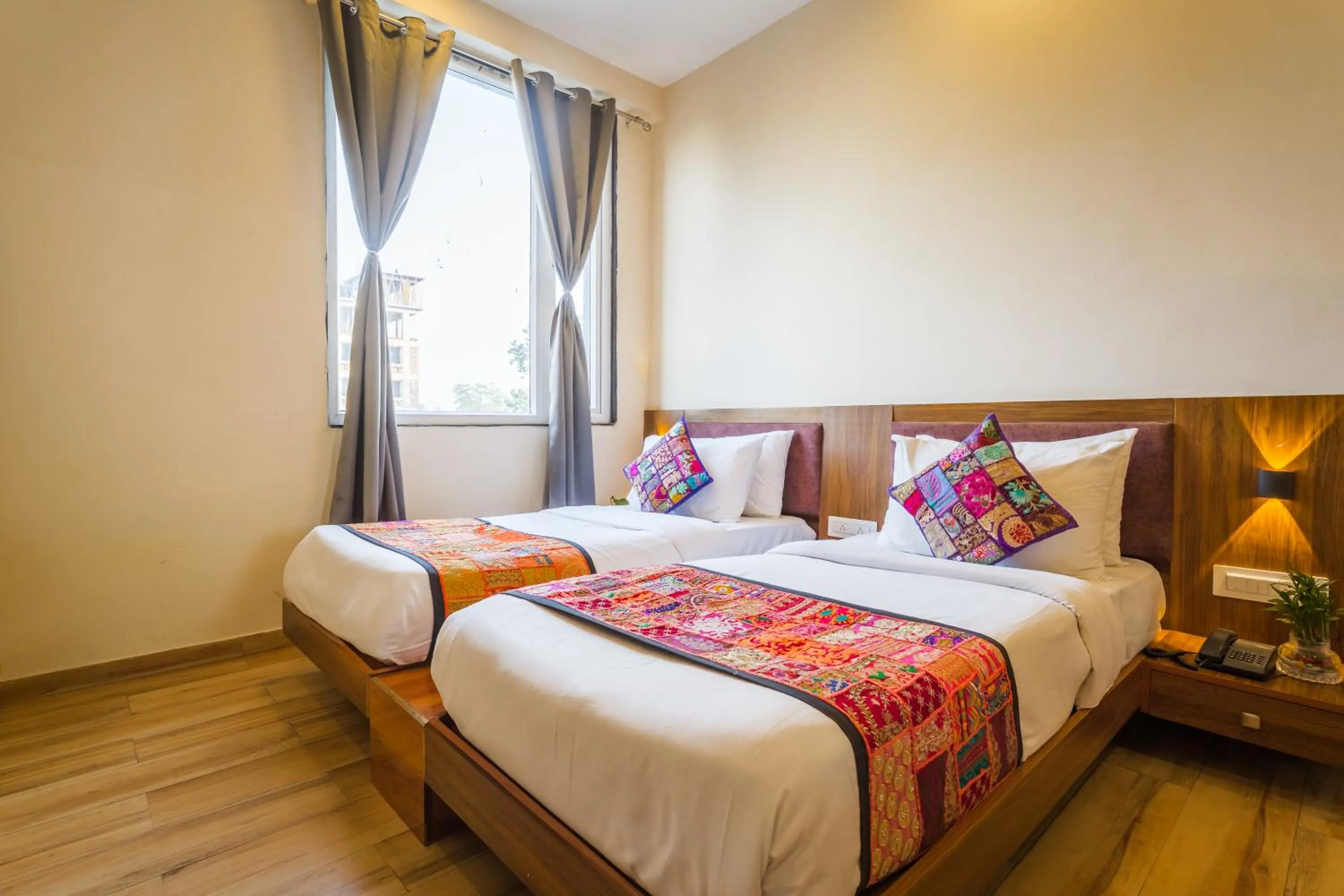 Bed in Tripli Hotels Le Shelton