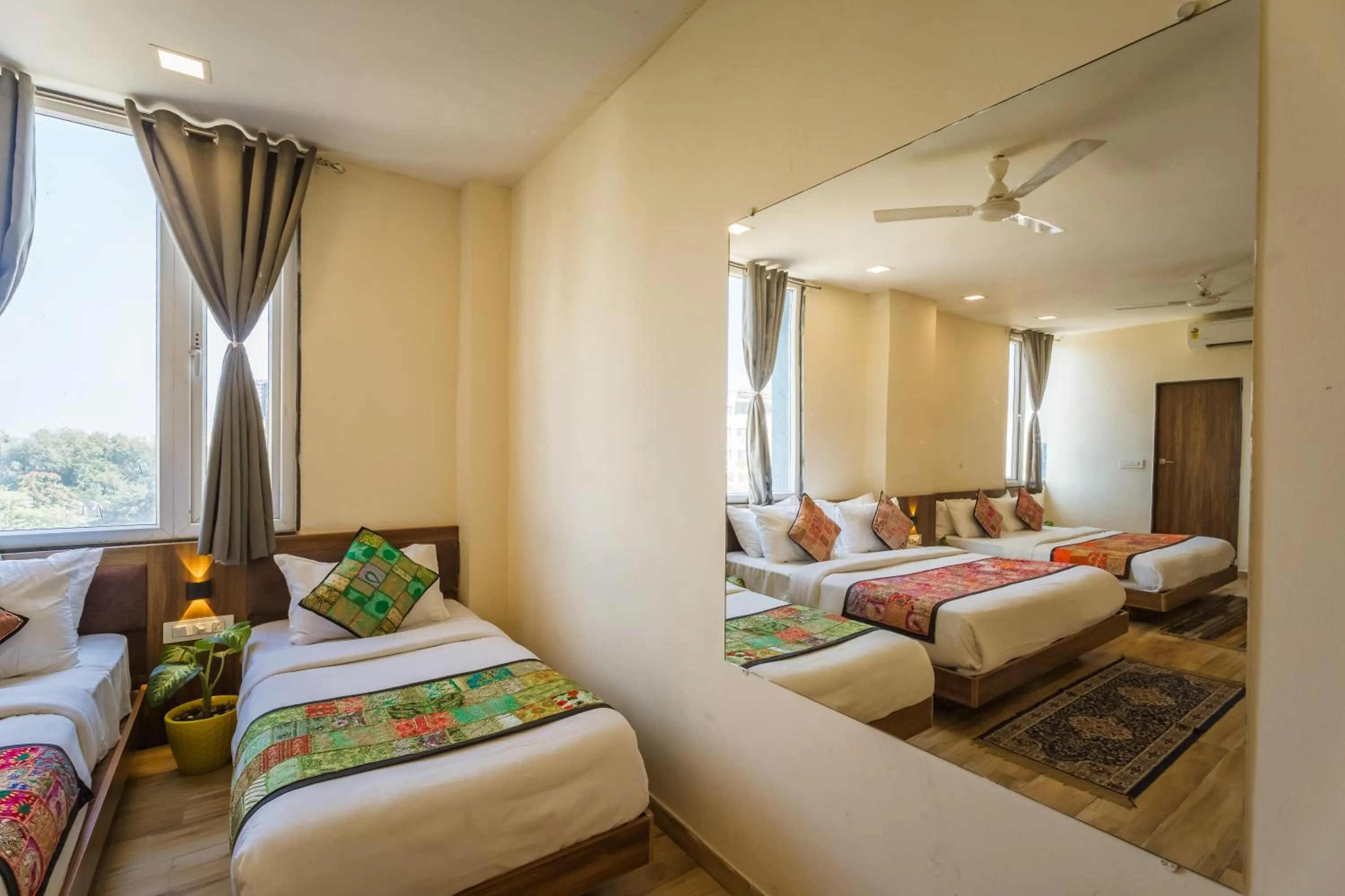 Bed in Tripli Hotels Le Shelton