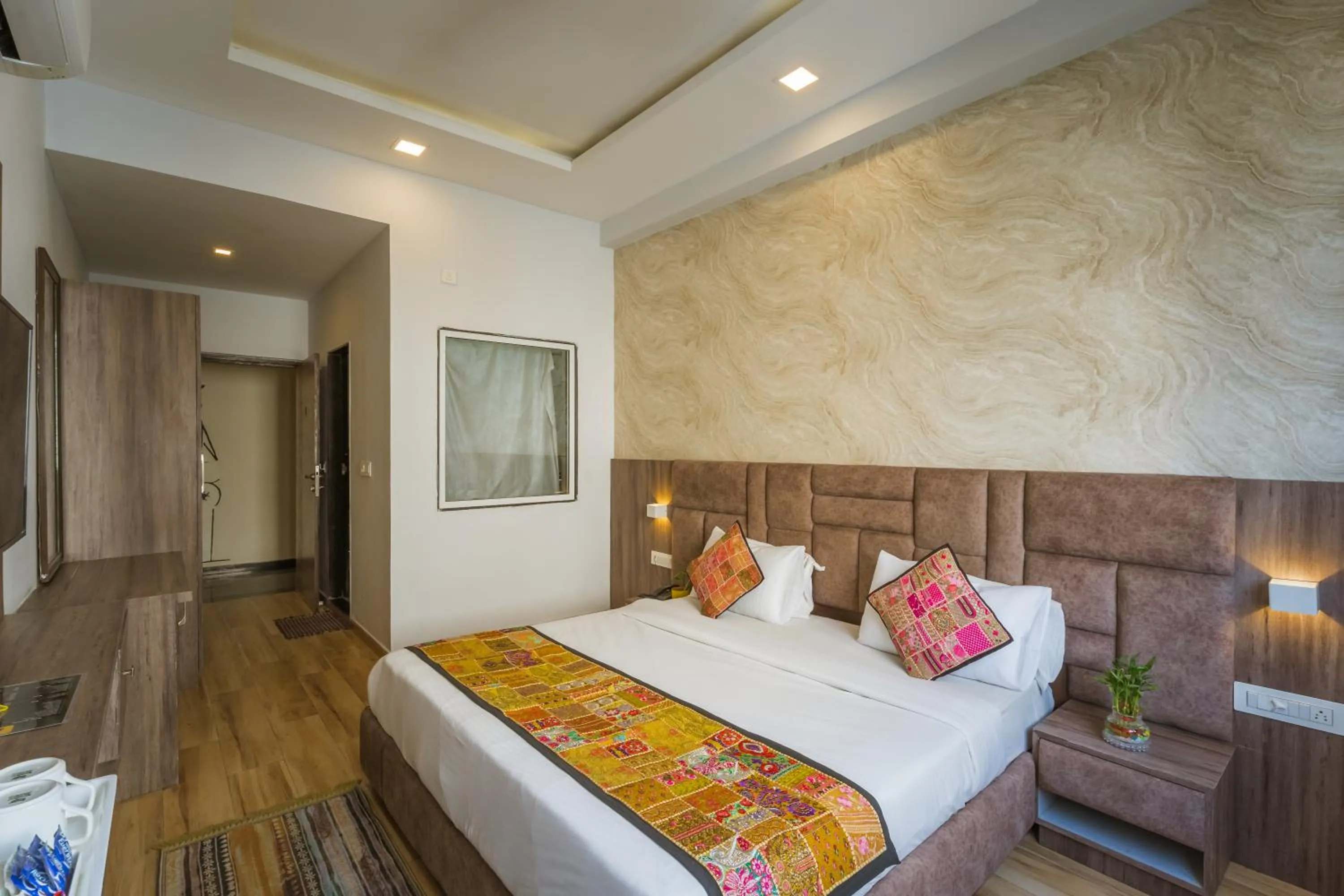 Bed in Tripli Hotels Le Shelton