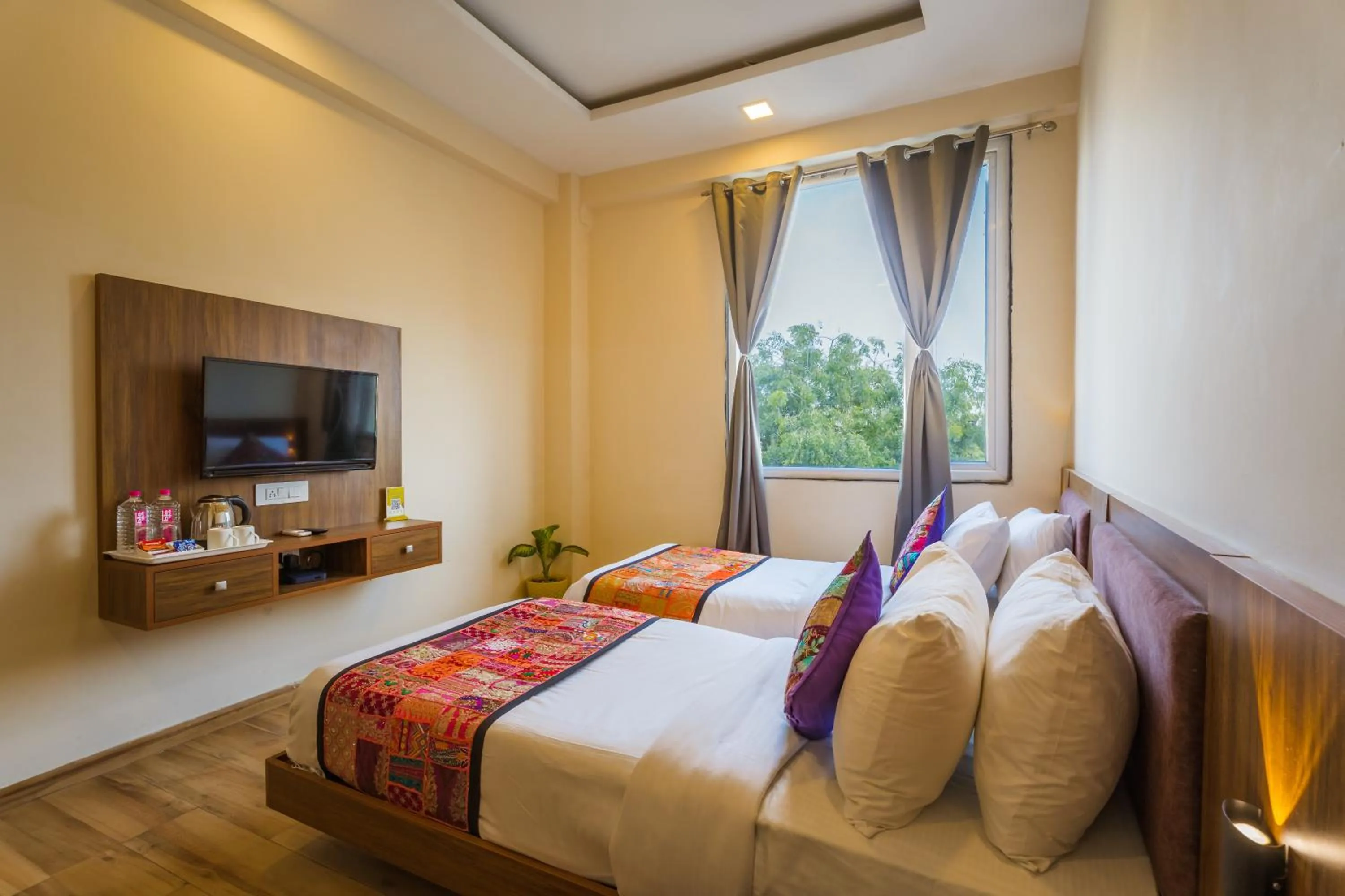 Bed in Tripli Hotels Le Shelton