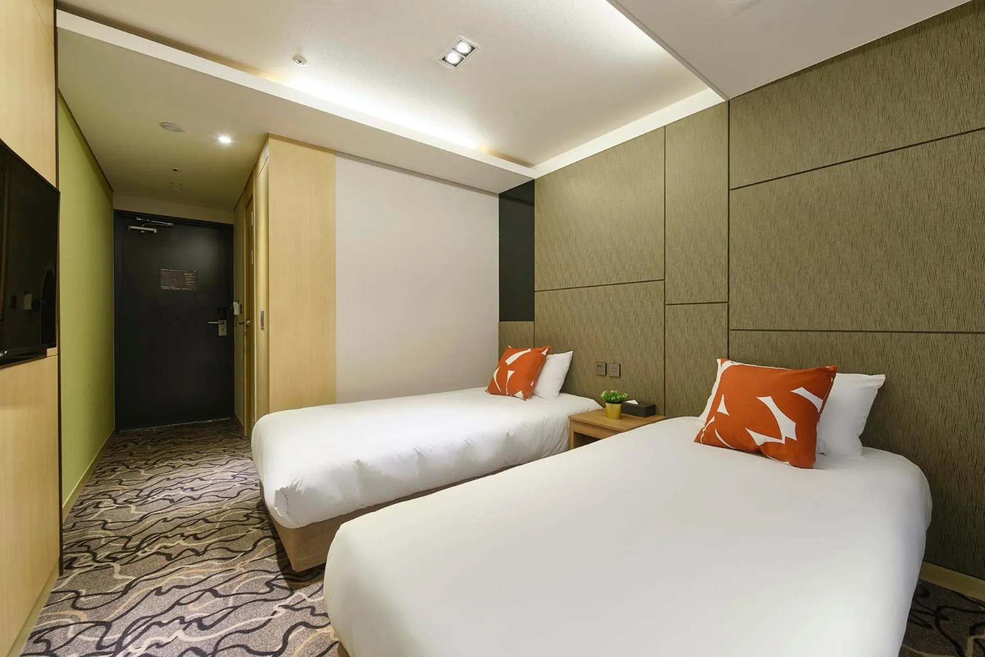 Bed in Jeju Grace Hotel