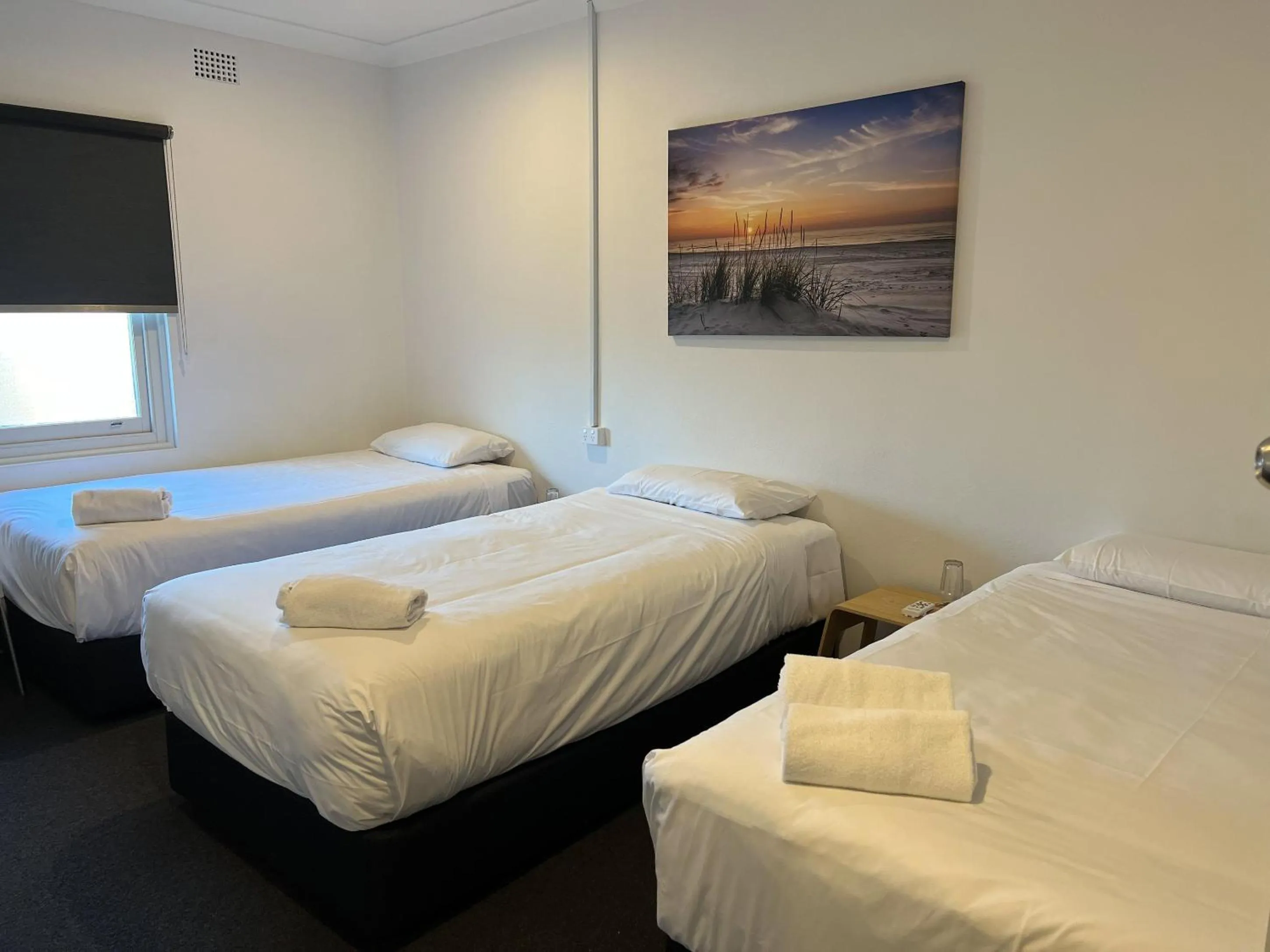 Bed in Plantation Hotel Coffs Harbour