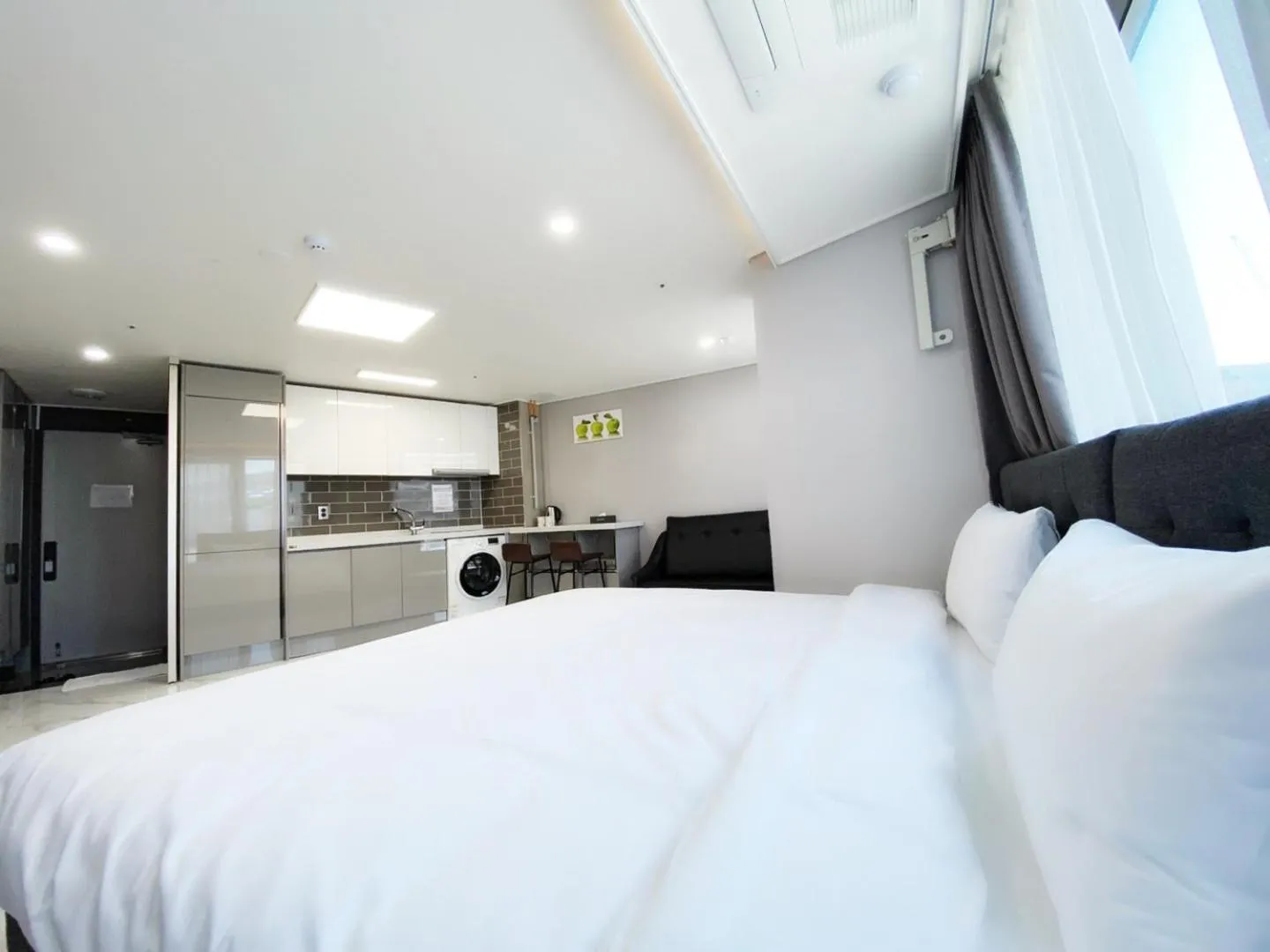 Bed in Songjeong Blue Castle Hotel