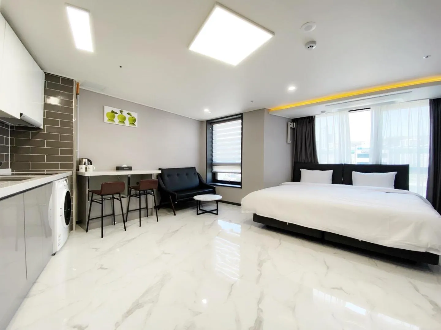 Bed in Songjeong Blue Castle Hotel