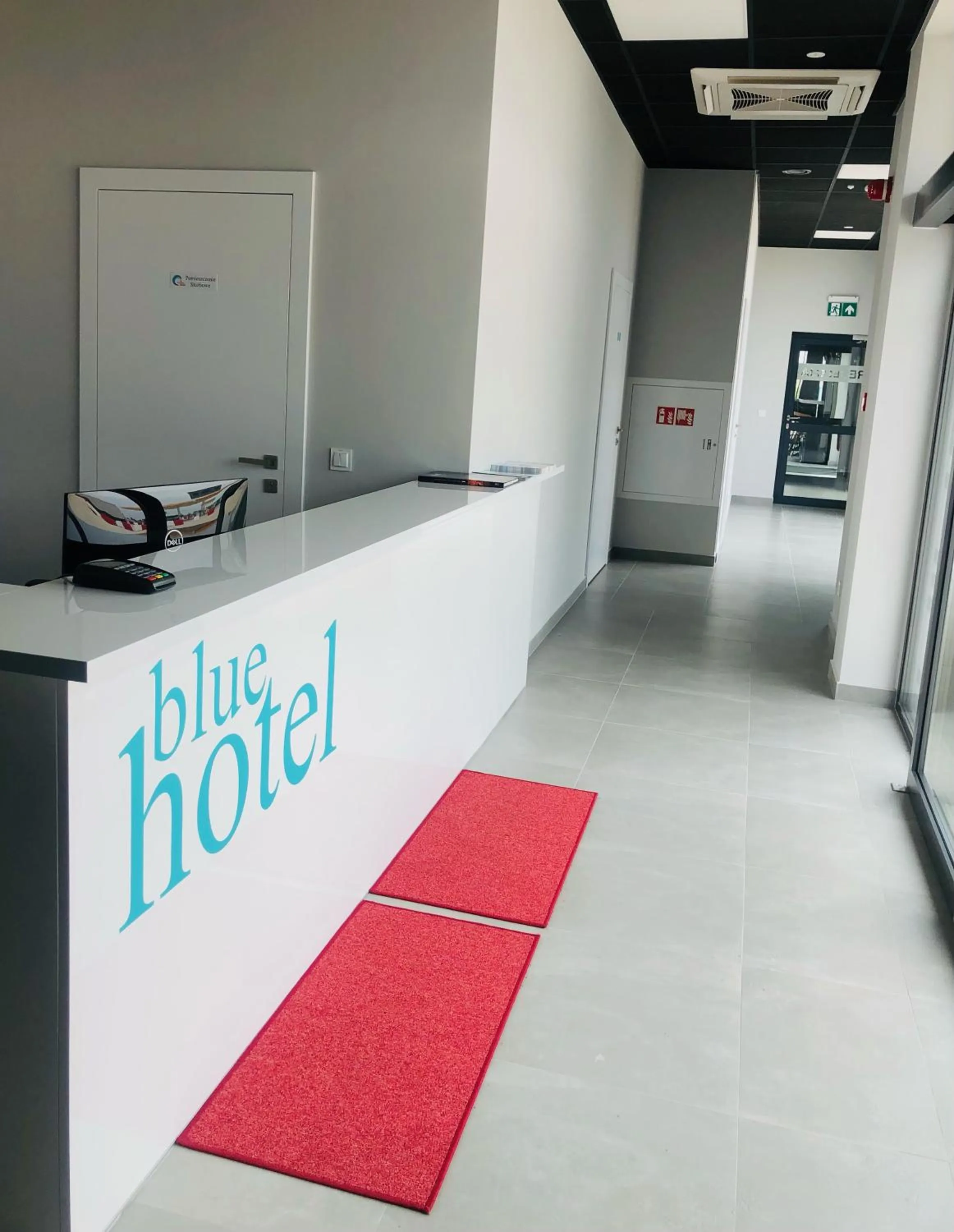 Lobby or reception in blue hotel