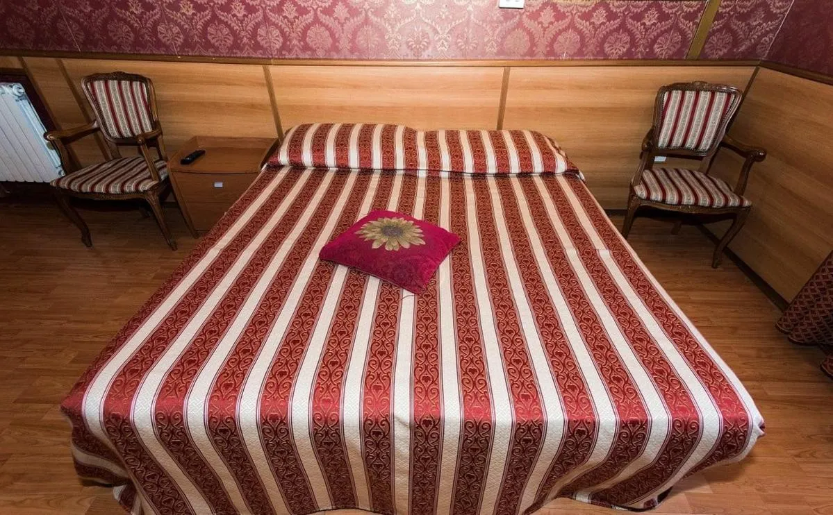 Bed in Hotel Artromano