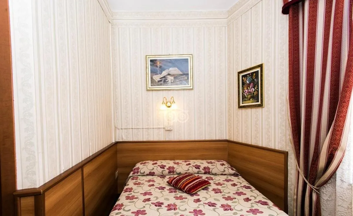 Bed in Hotel Artromano