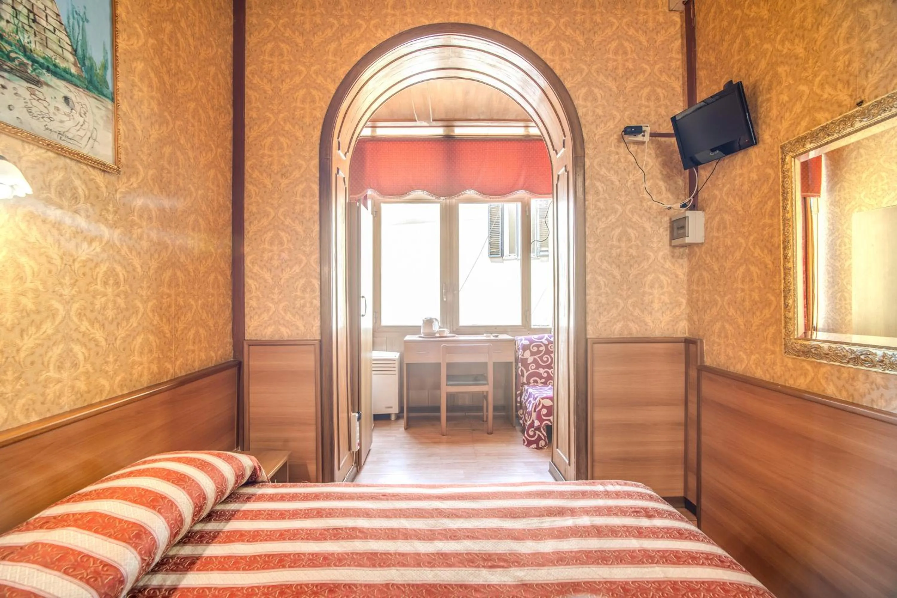 Living room, Bed in Hotel Artromano