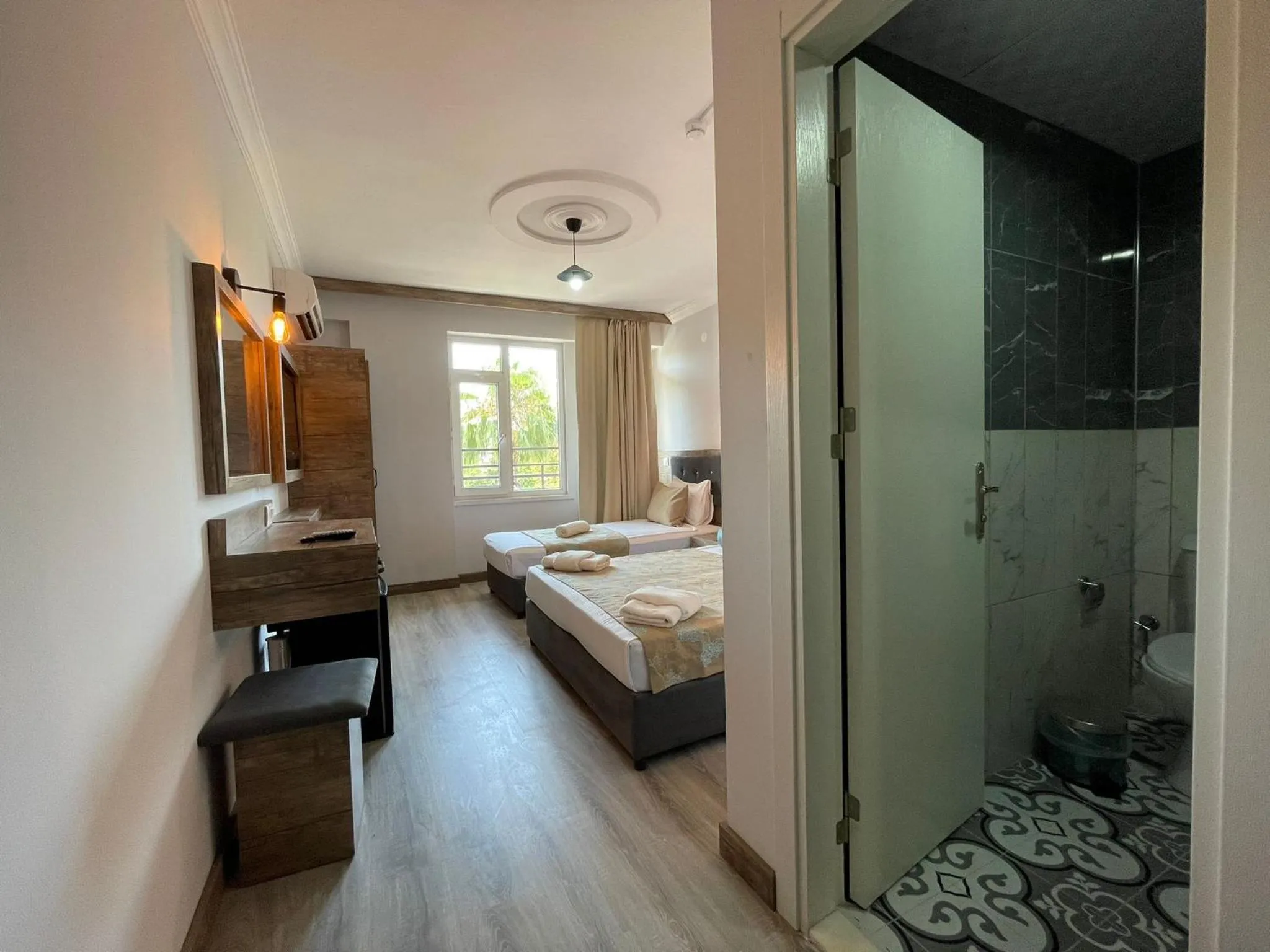 Photo of the whole room, Bed in Seven City Hotel