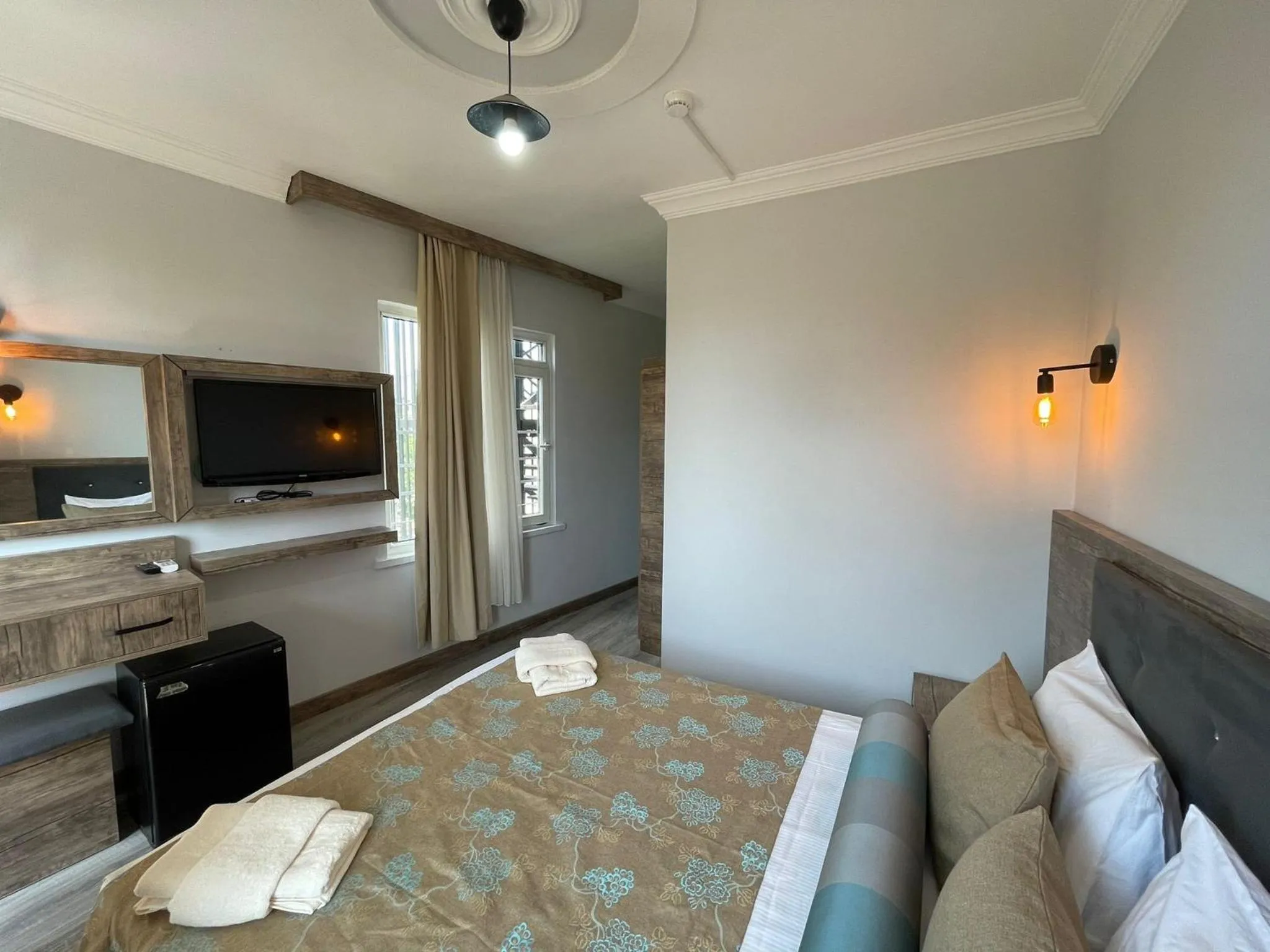 Bed in Seven City Hotel