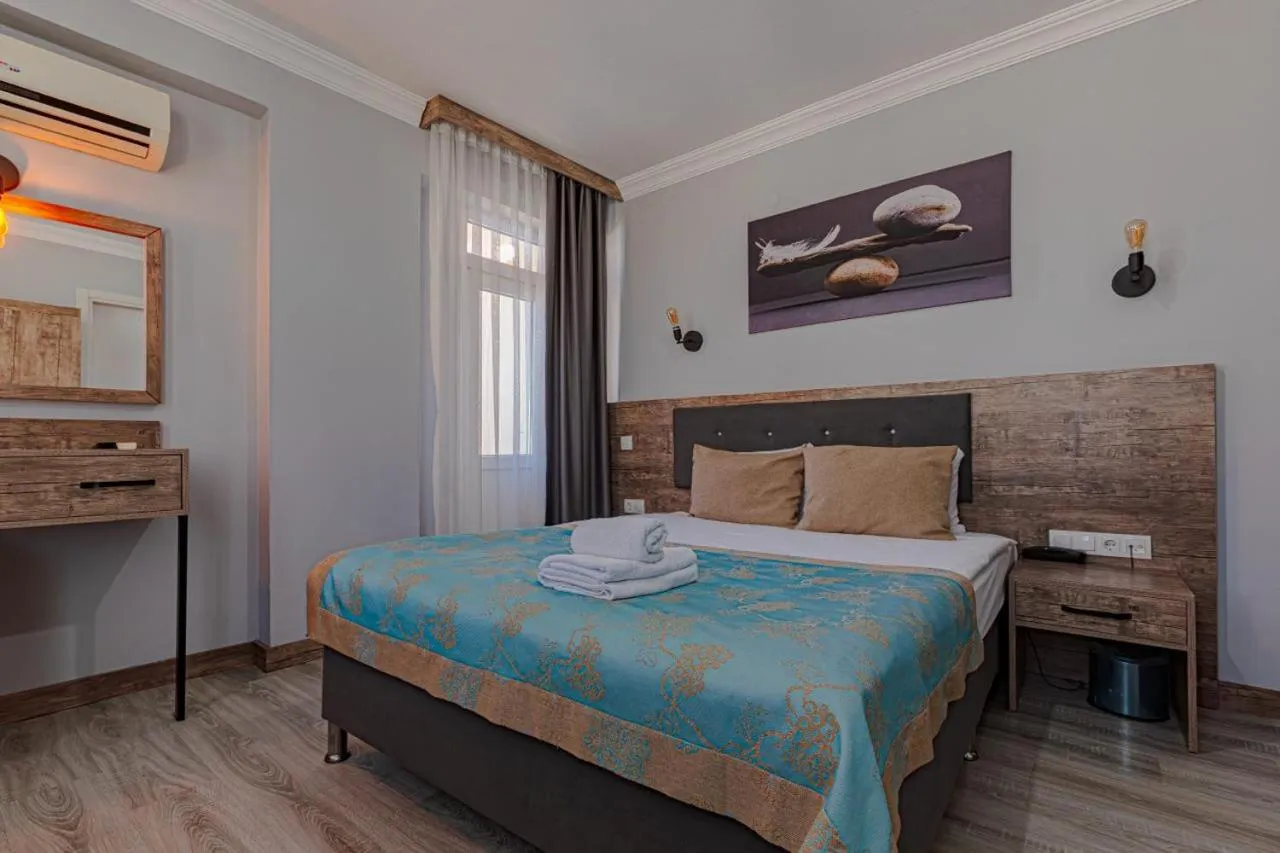 Bed in Seven City Hotel