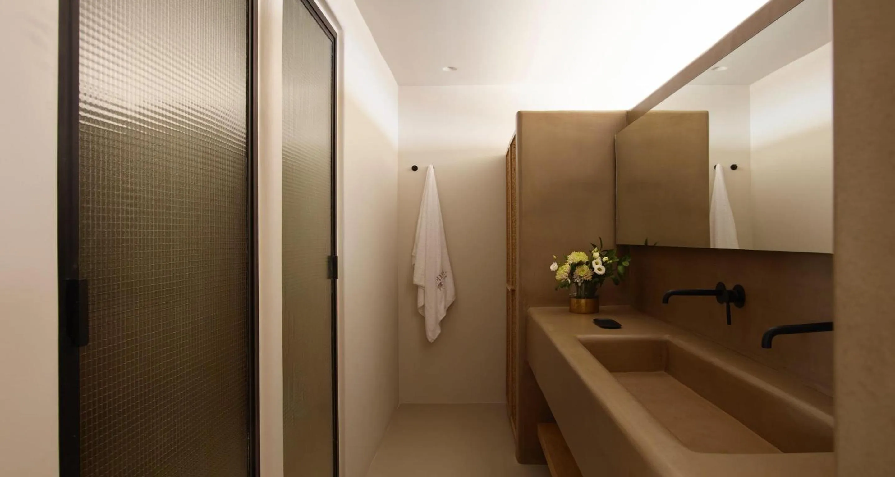 Bathroom in Collini Hotel Mykonos, WorldHotels Elite