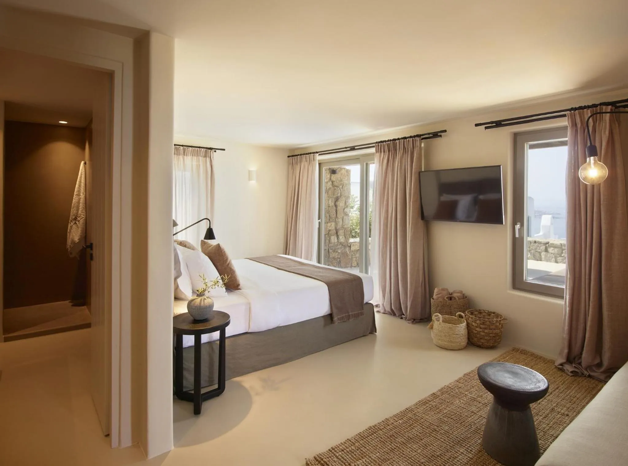 Bed in Collini Hotel Mykonos, WorldHotels Elite