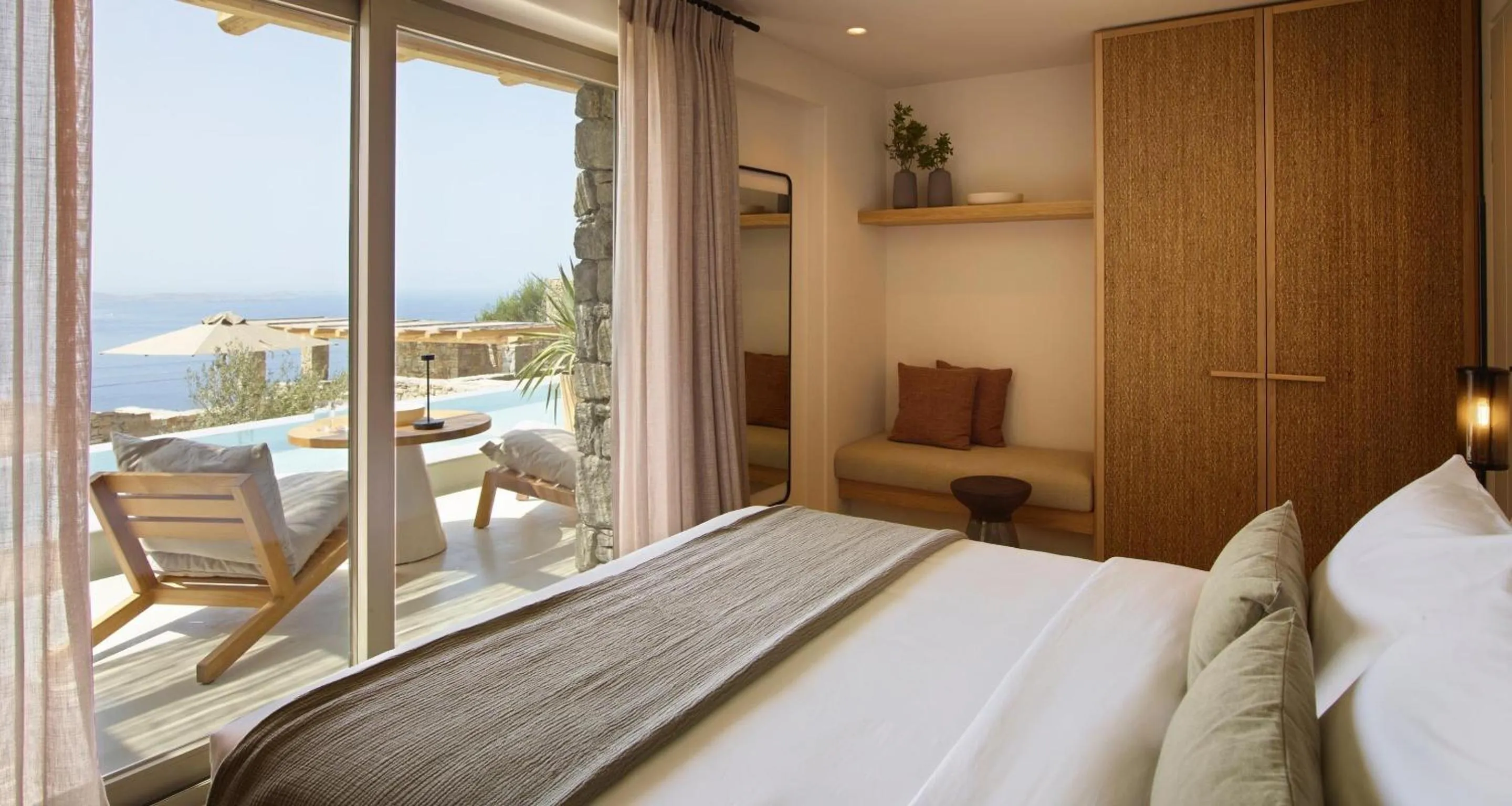 Pool view, Bed in Collini Hotel Mykonos, WorldHotels Elite