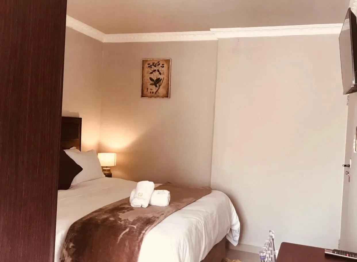 Bed in The Madam Herself B&B