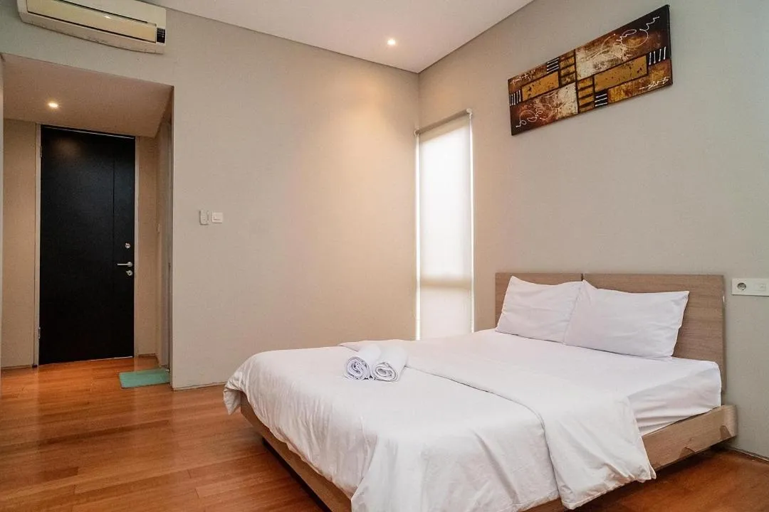 Bed in Three J Residence