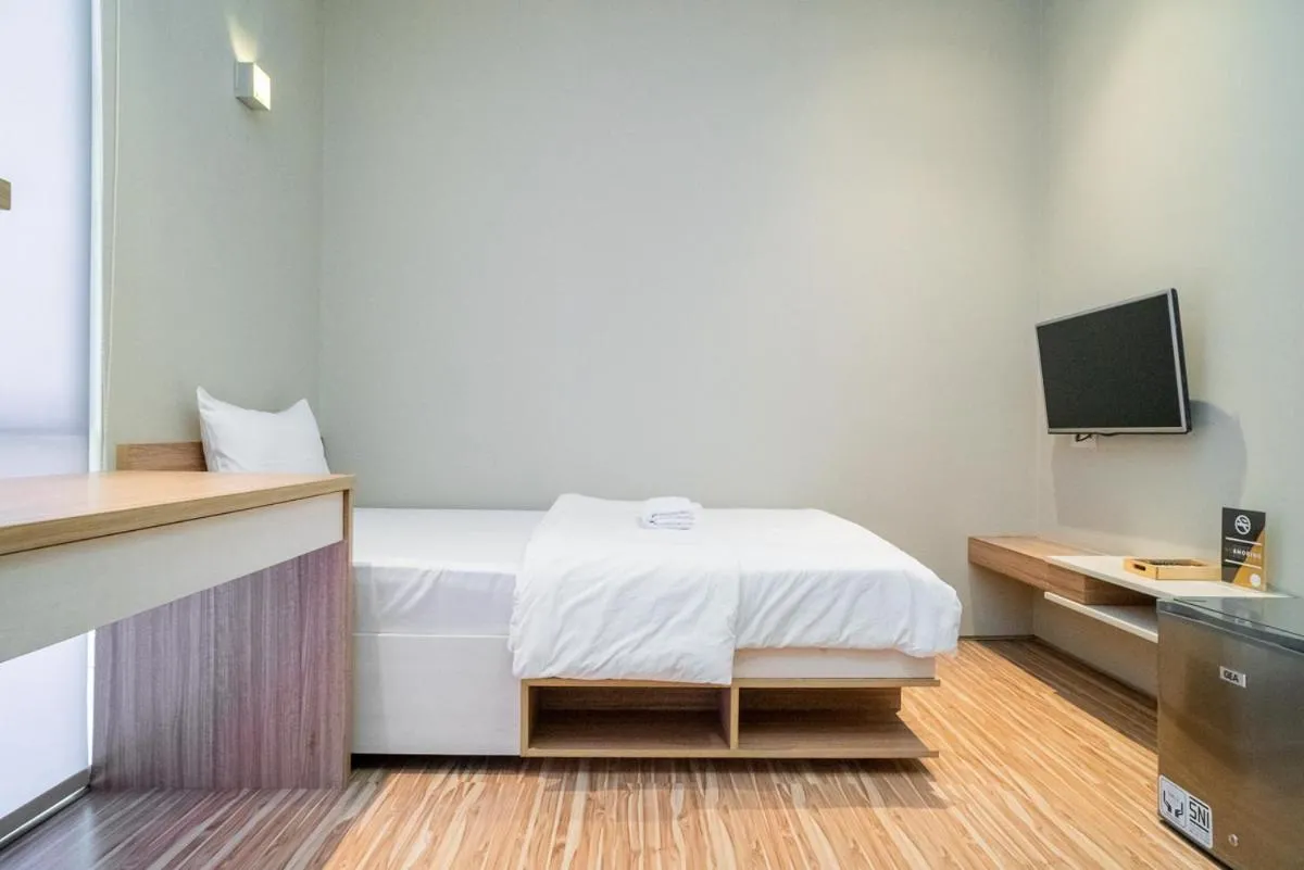 Bed in Three J Residence