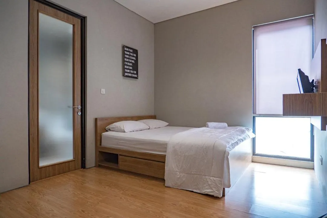 Bed in Three J Residence