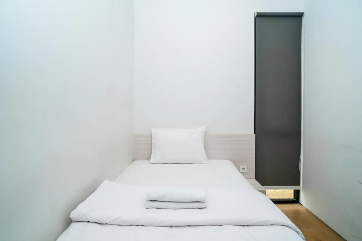 Bed in Three J Residence