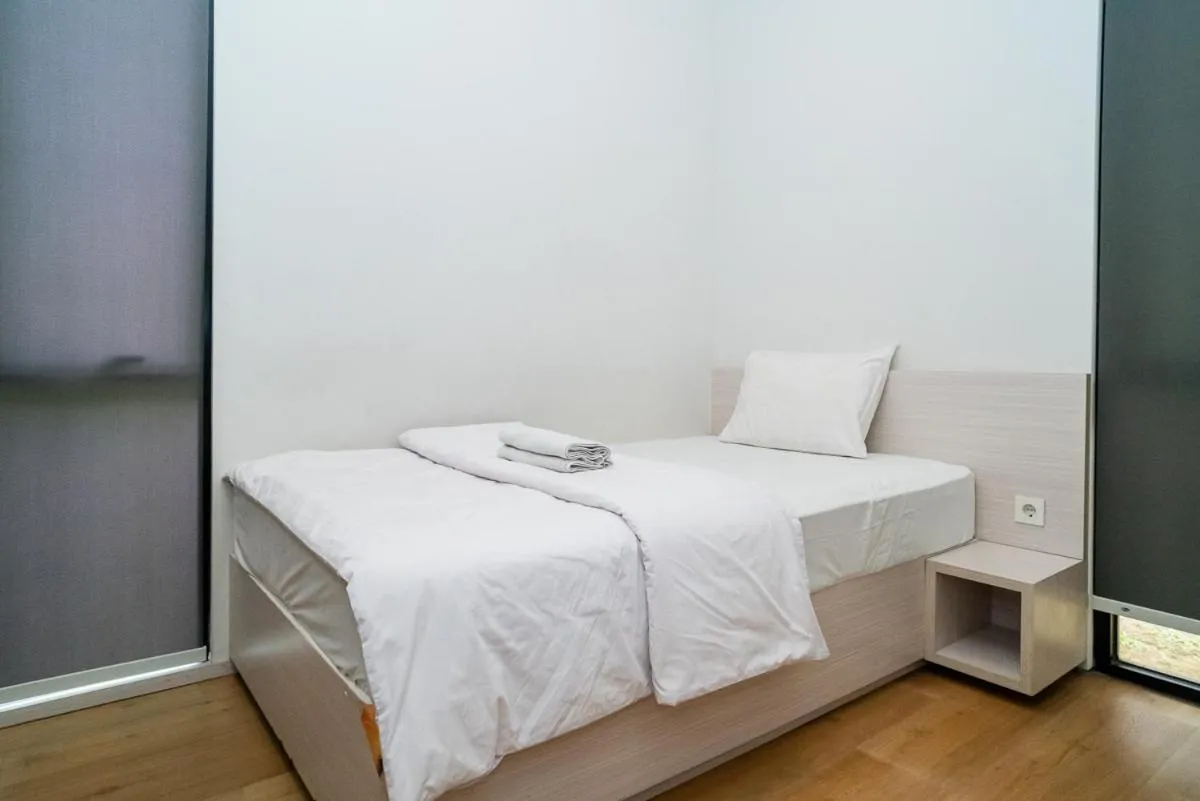 Bed in Three J Residence