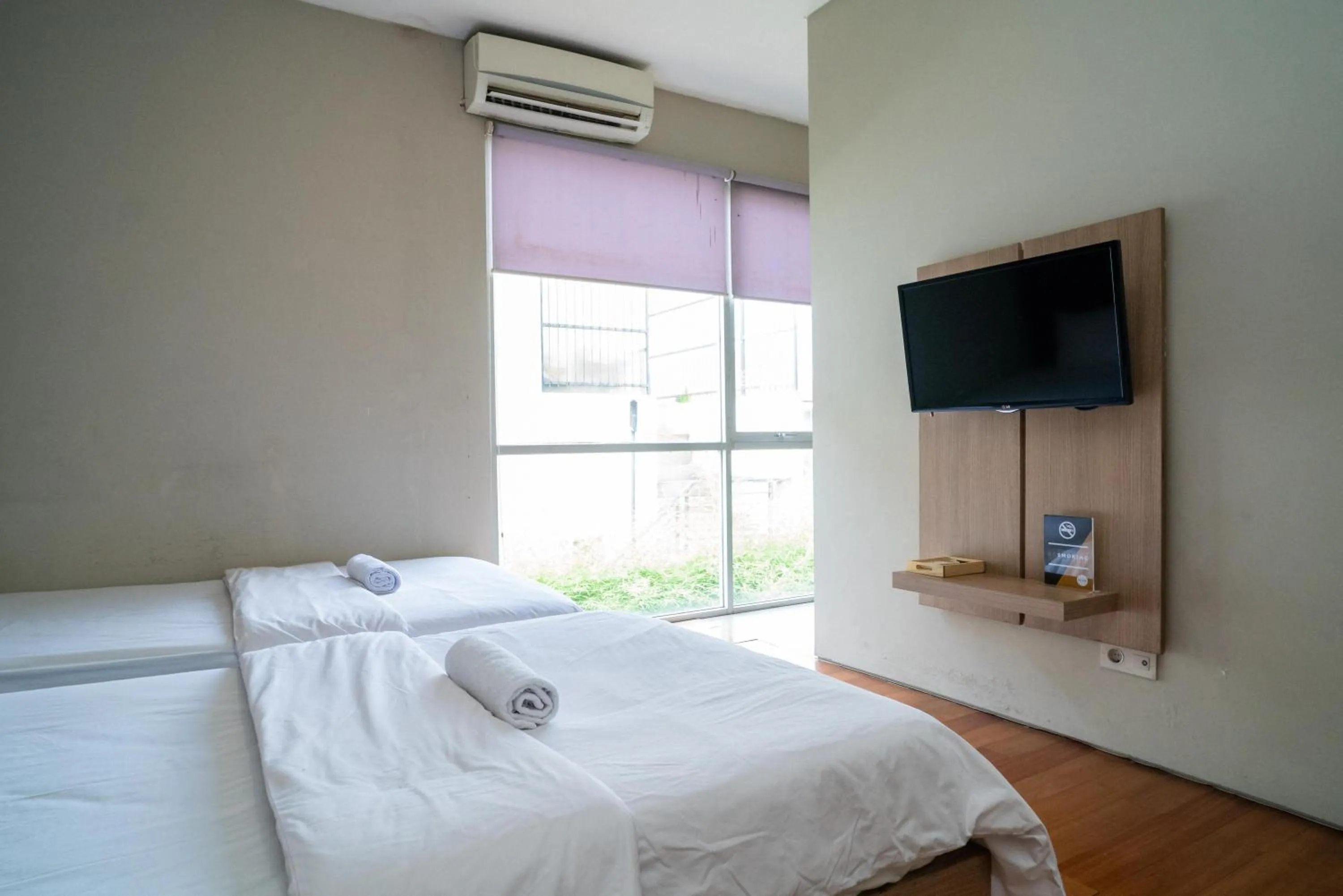 Bed in Three J Residence