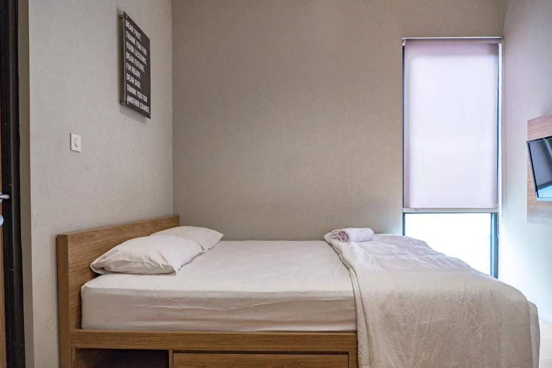 Bed in Three J Residence