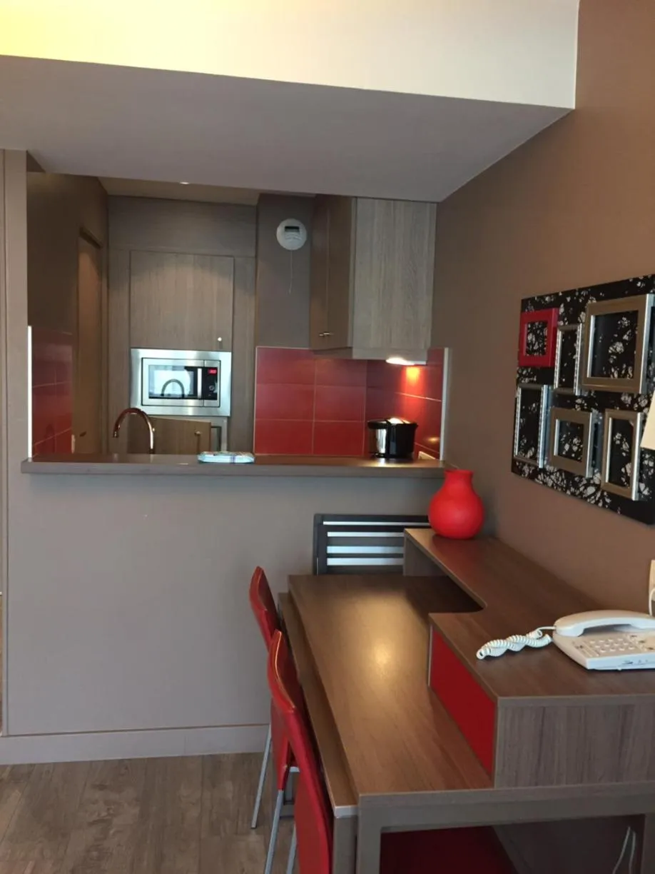 Kitchen or kitchenette in Adagio Caen Centre