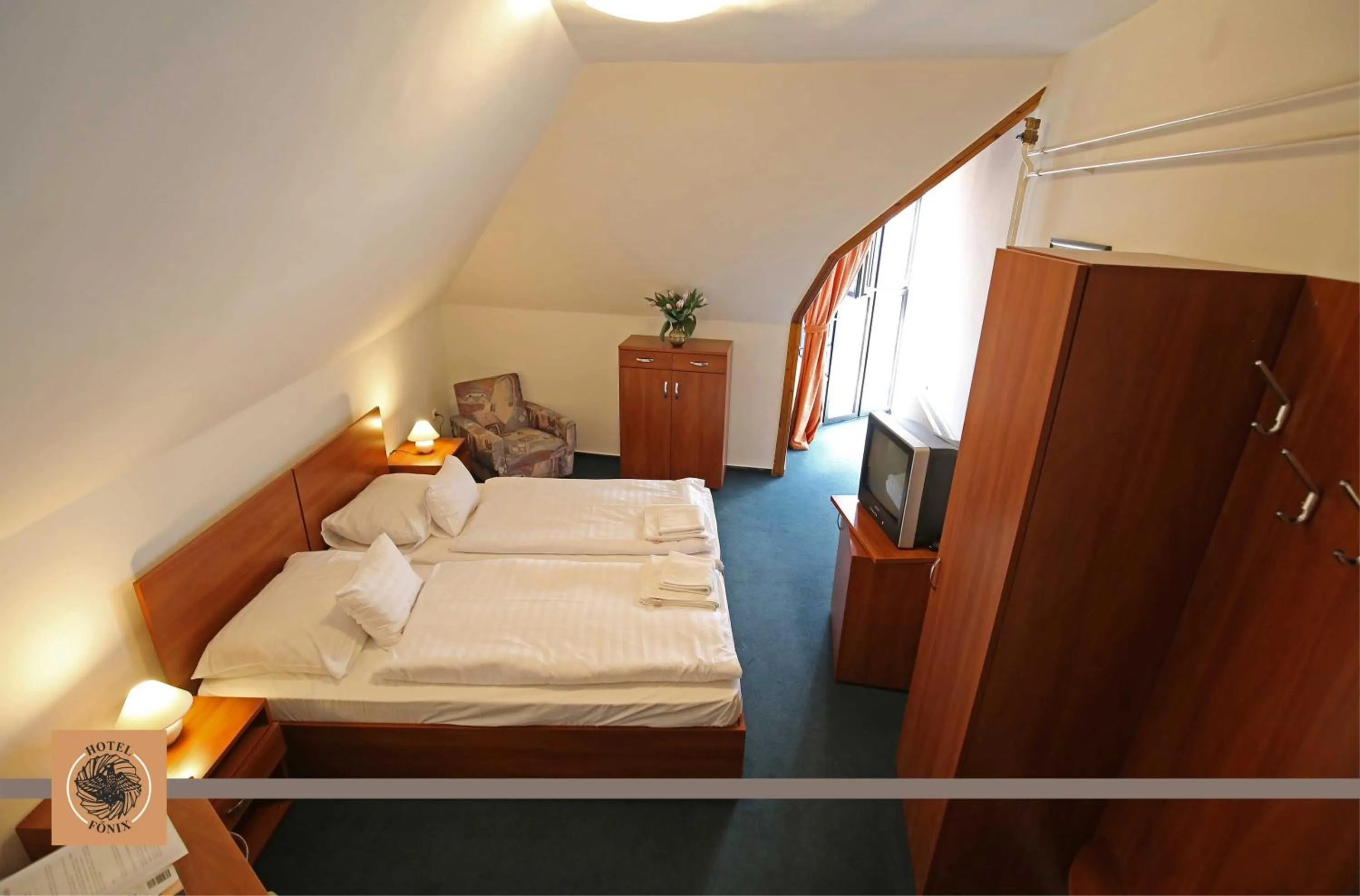 Photo of the whole room, Bed in Hotel Főnix