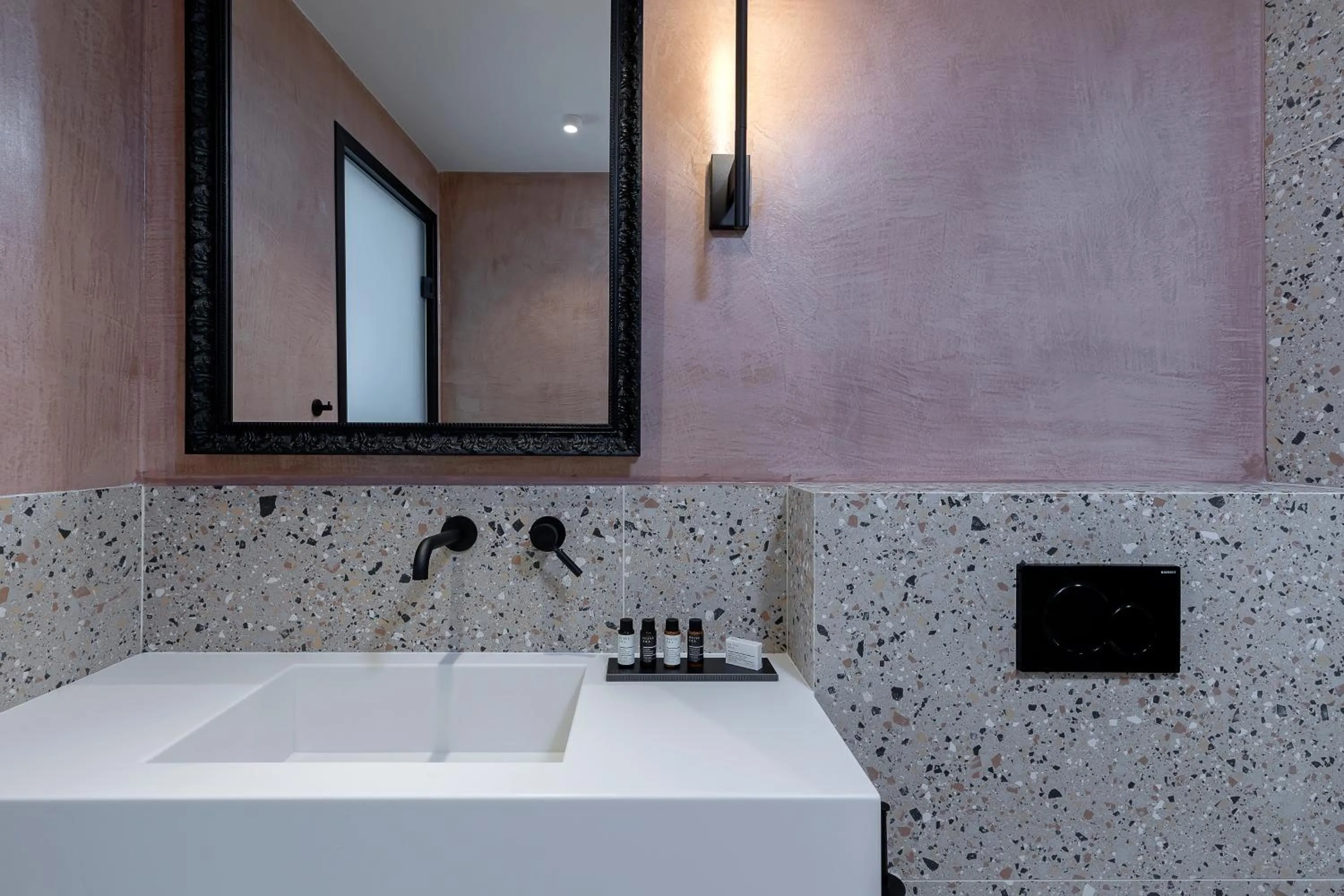 Bathroom in The Athenians Art Apartments