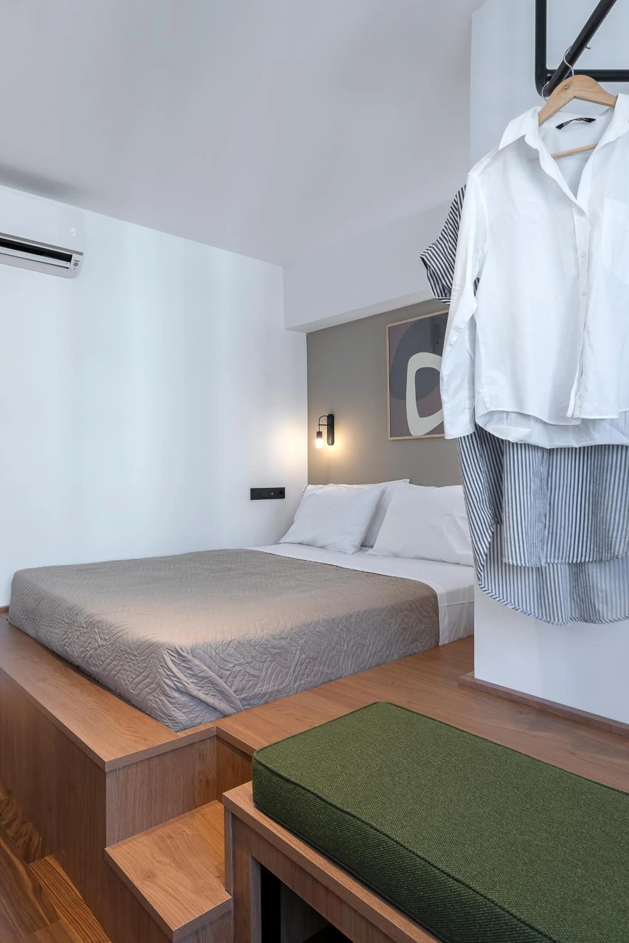 Bed in The Athenians Art Apartments