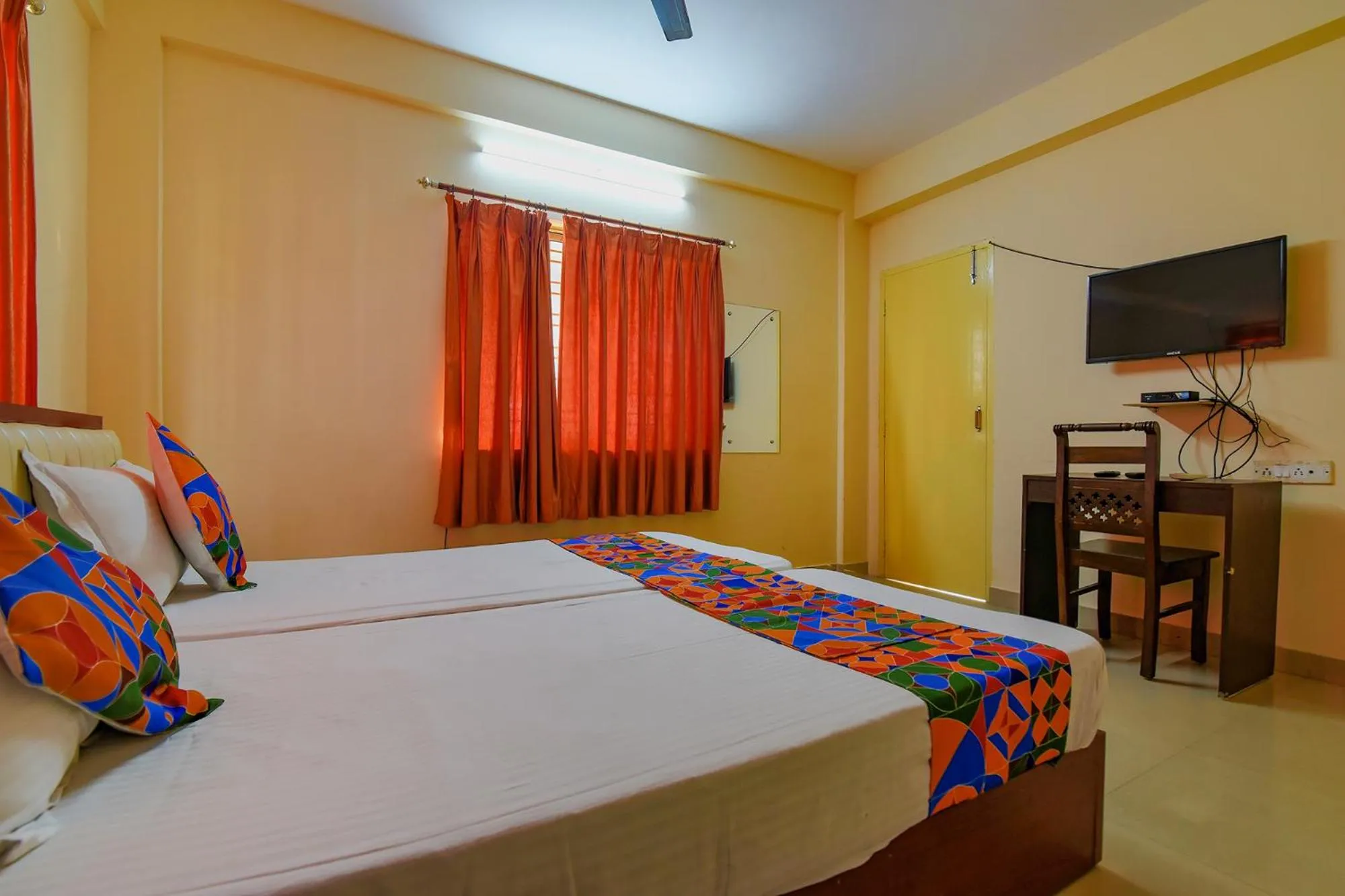 Bed in FabHotel Capital Casa