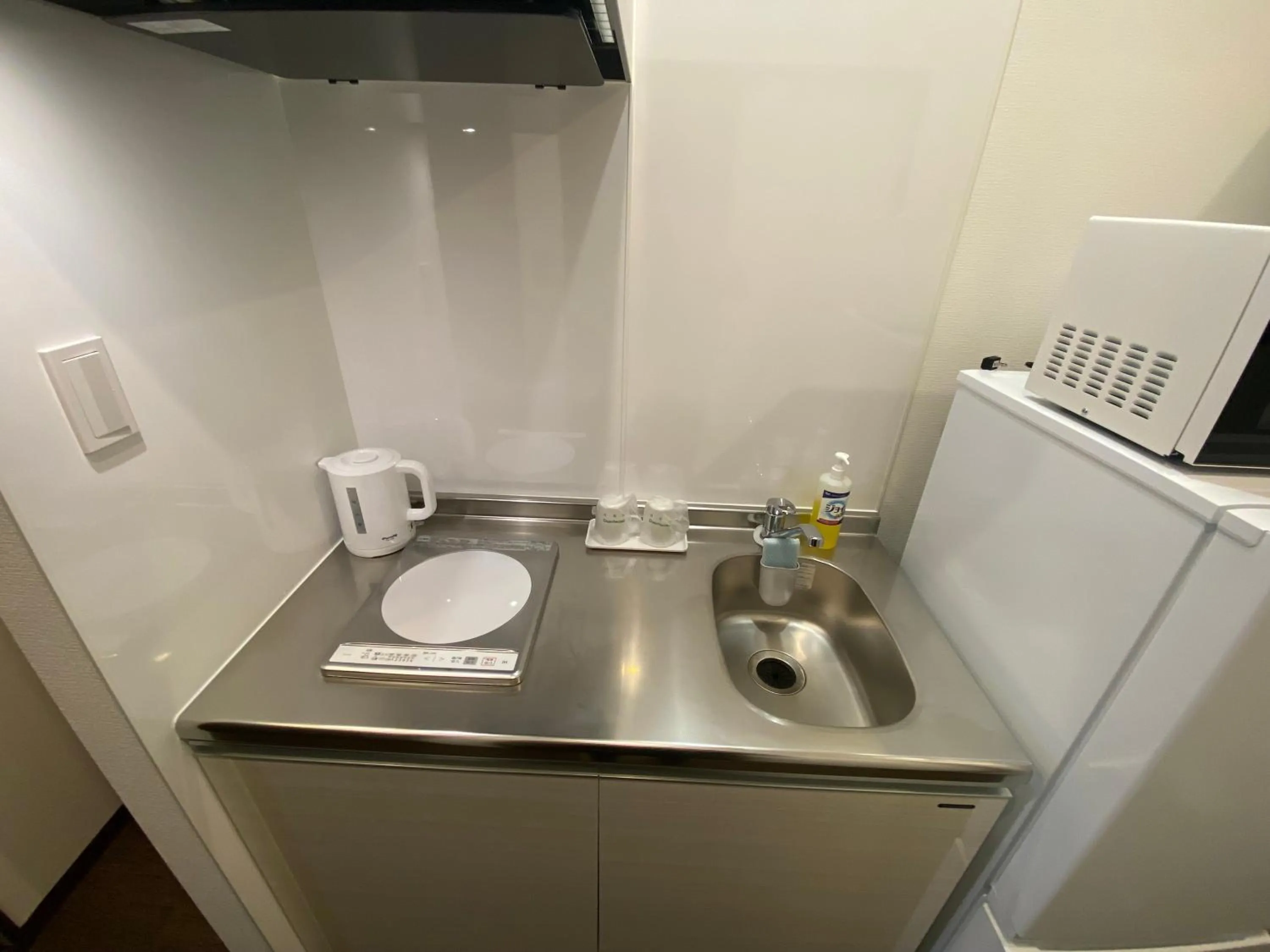 Kitchen or kitchenette in HOTEL GranLeaf Miyakojima