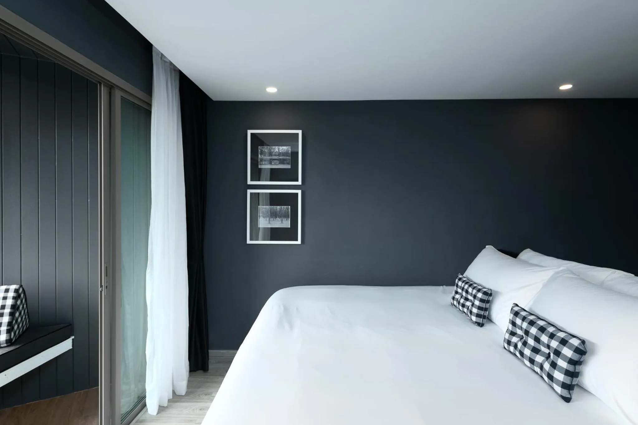 Bed in Foto Hotel Phuket Beachfront