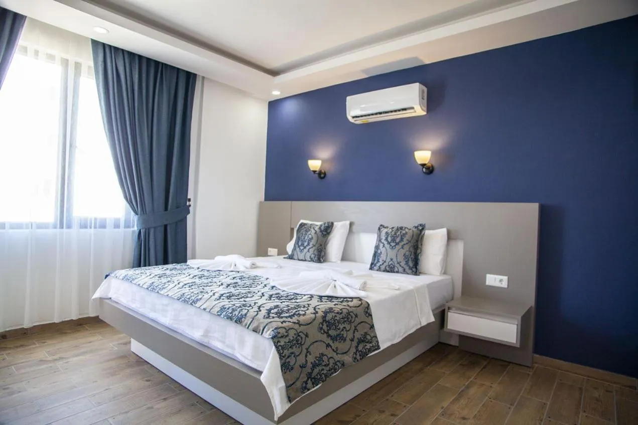 Bed in Demyra Boutique Hotel