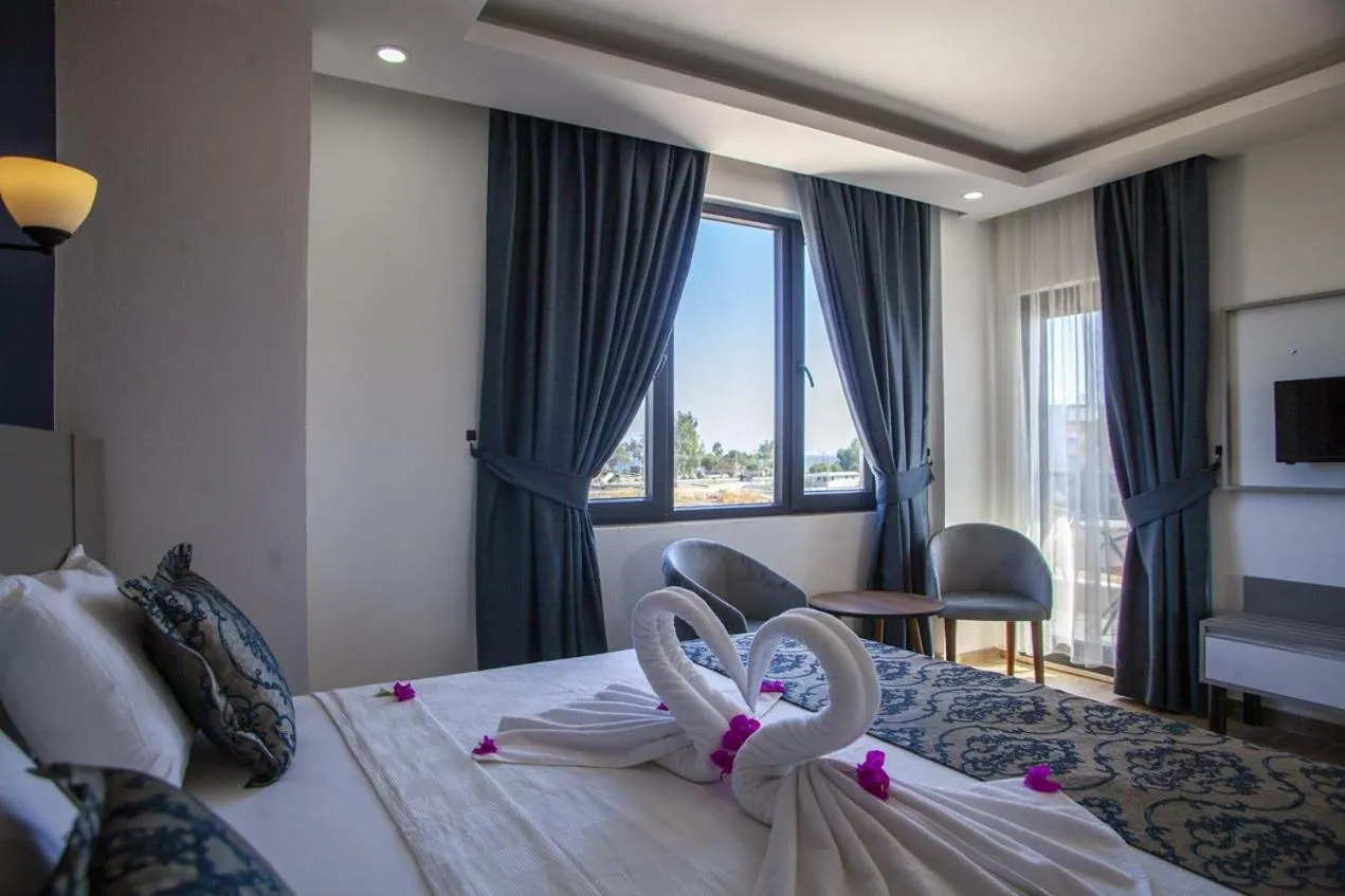 Bed in Demyra Boutique Hotel