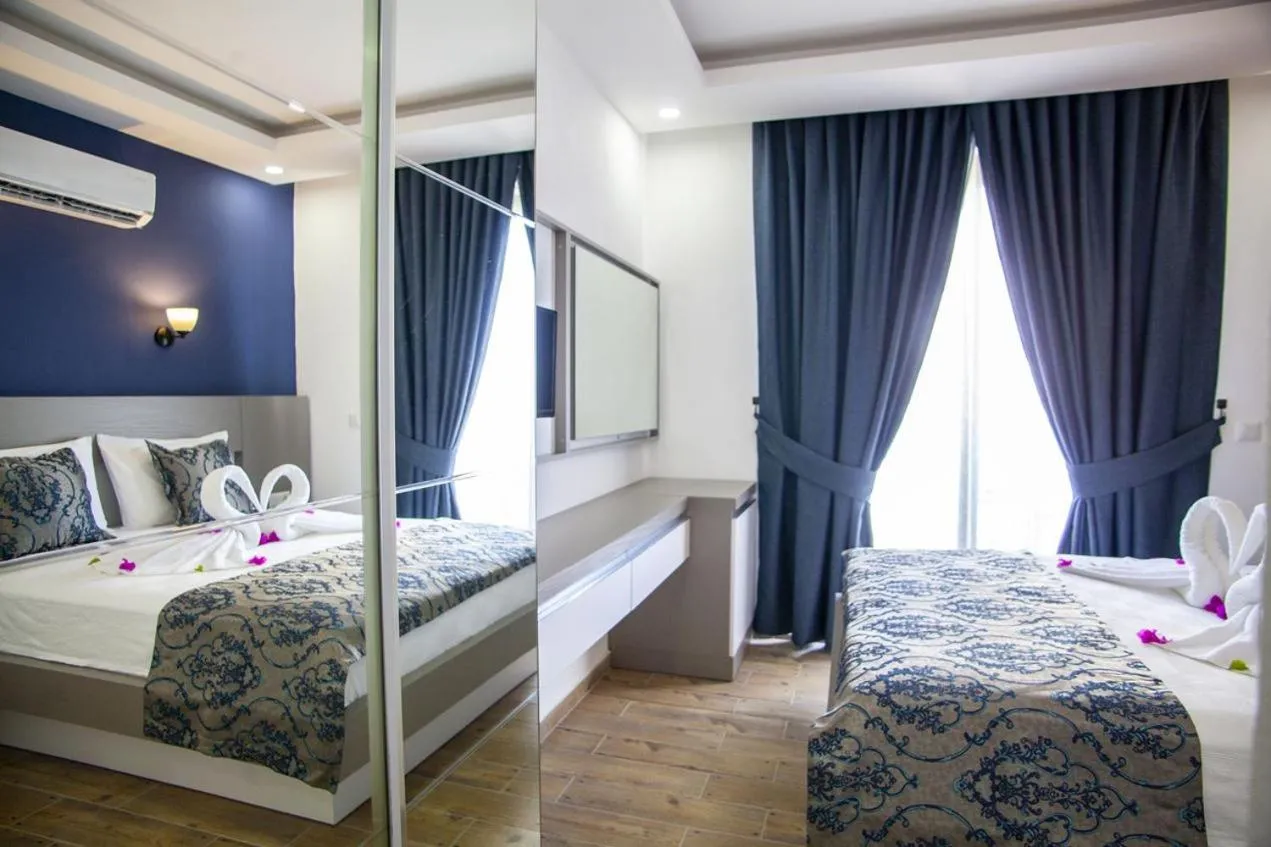 Bed in Demyra Boutique Hotel