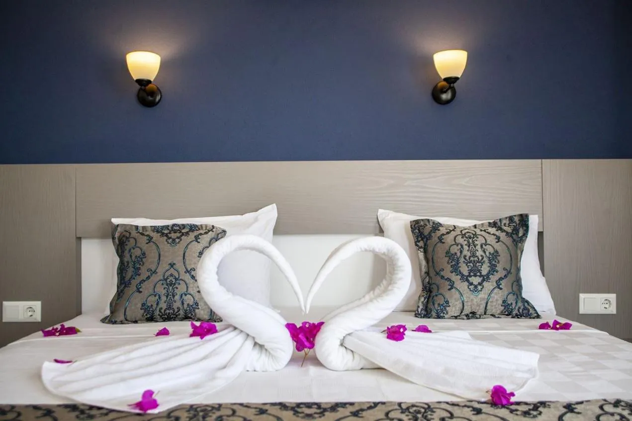 Bed in Demyra Boutique Hotel