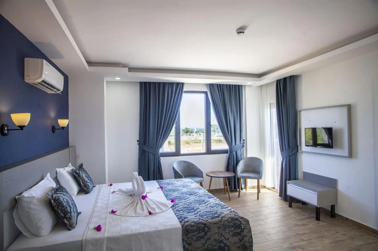 Bed in Demyra Boutique Hotel